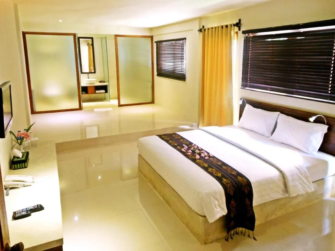 Bed in The Pade Dive Resort