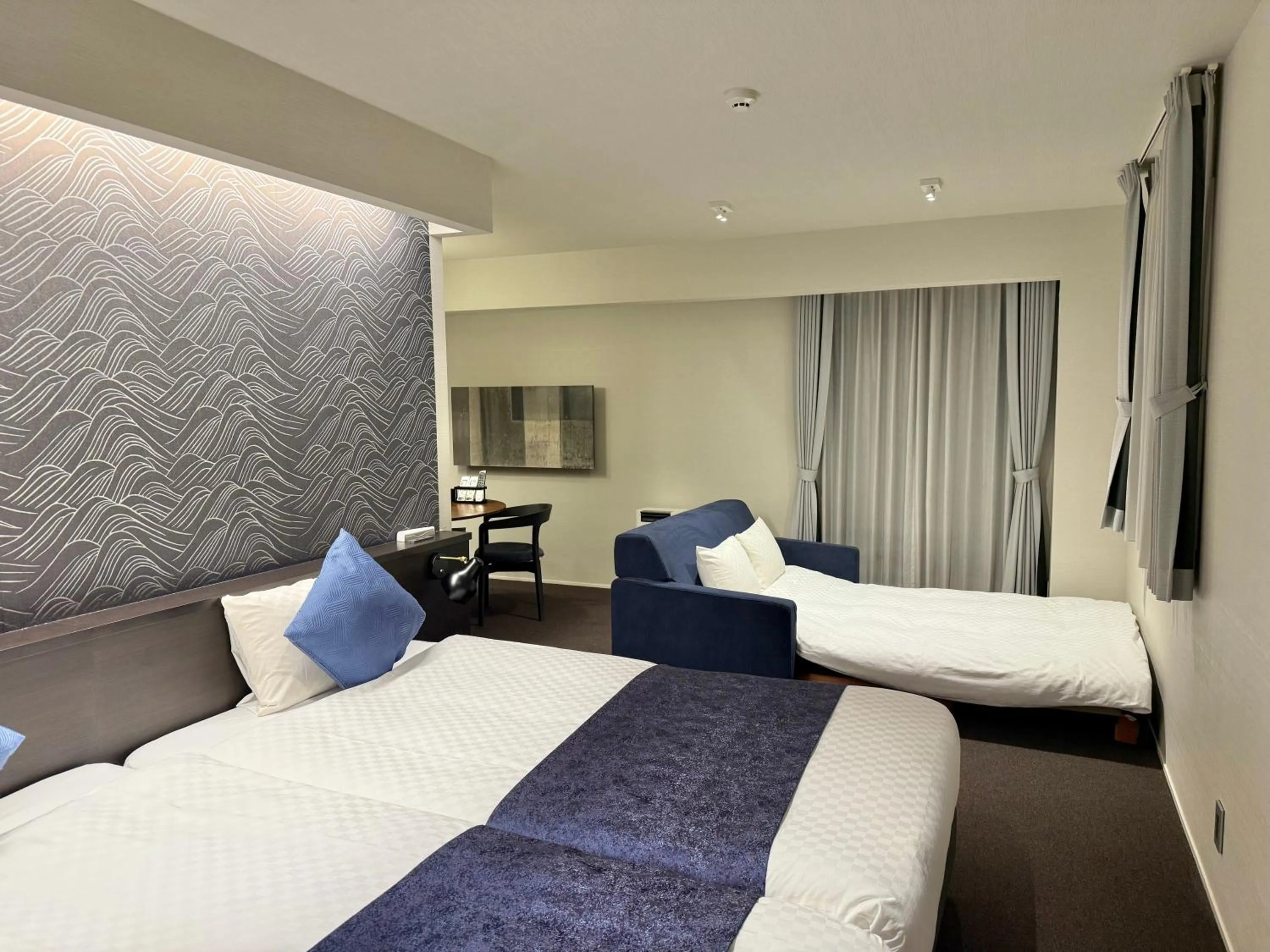 Bed in HOTEL MASTAY jingumichi