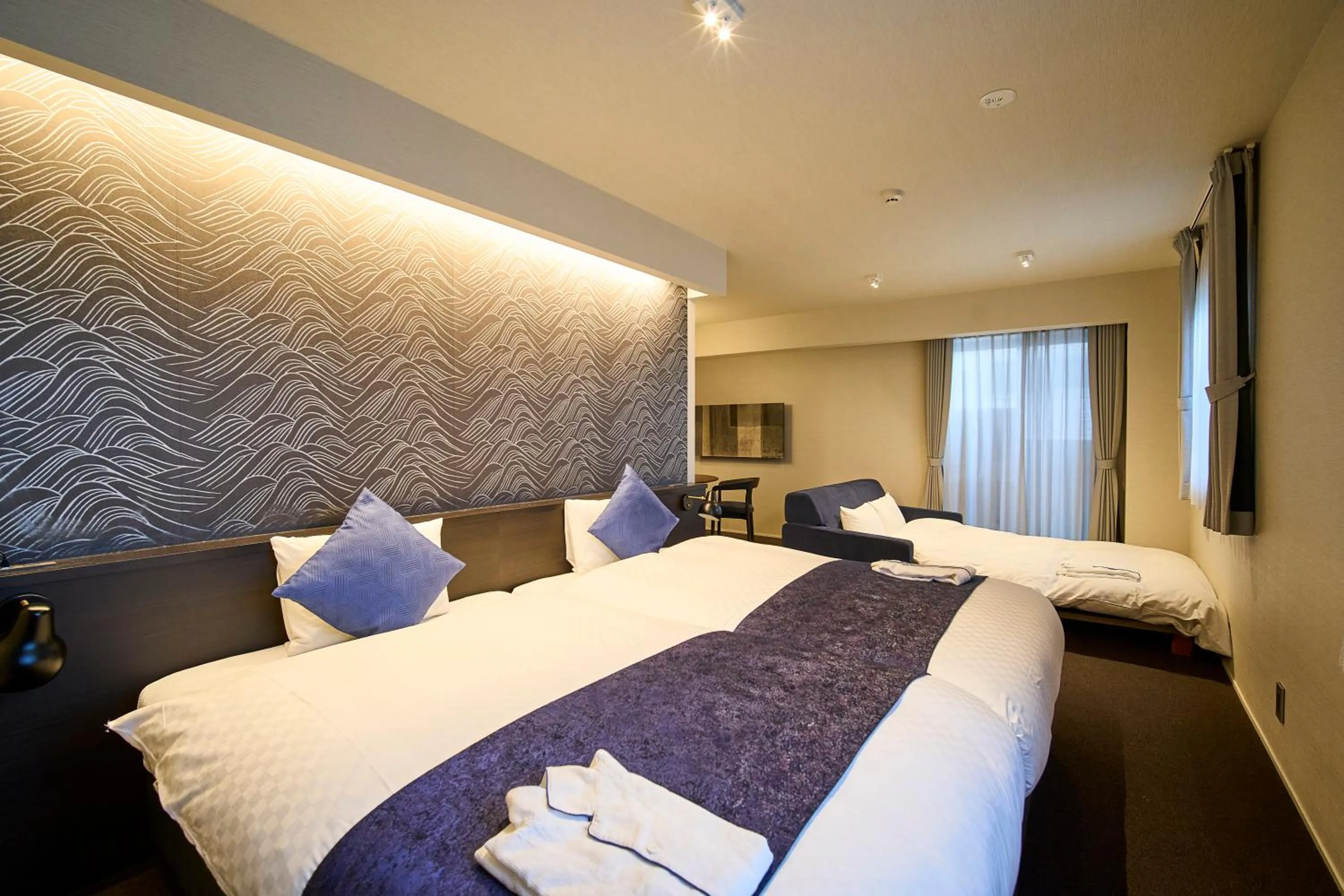 Bed in HOTEL MASTAY jingumichi