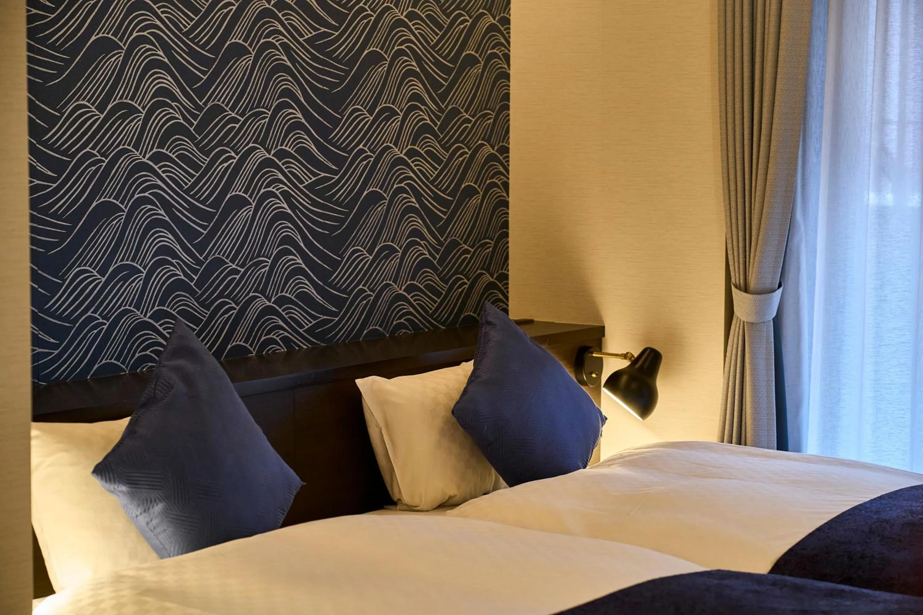 Bed in HOTEL MASTAY jingumichi