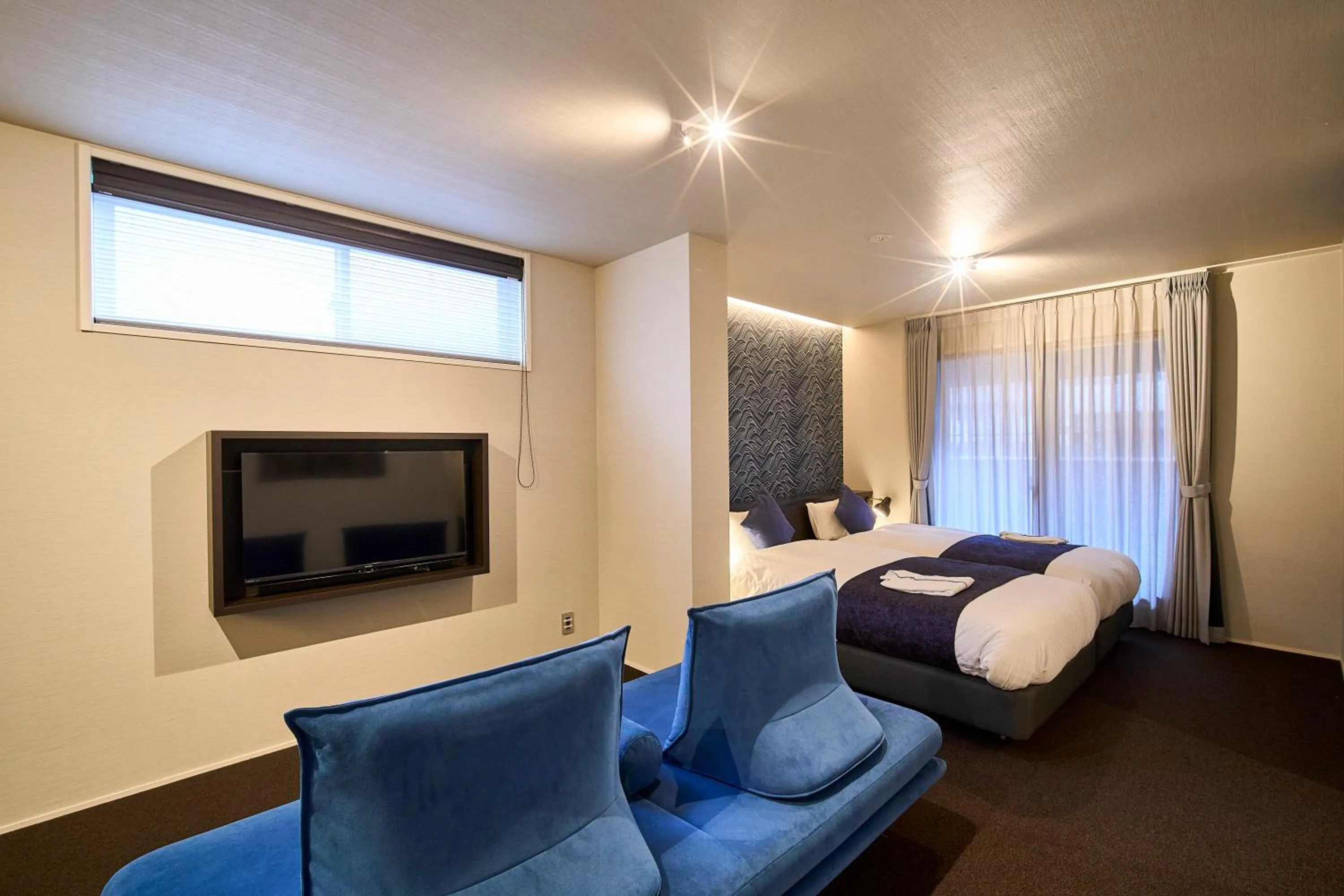 Bed in HOTEL MASTAY jingumichi