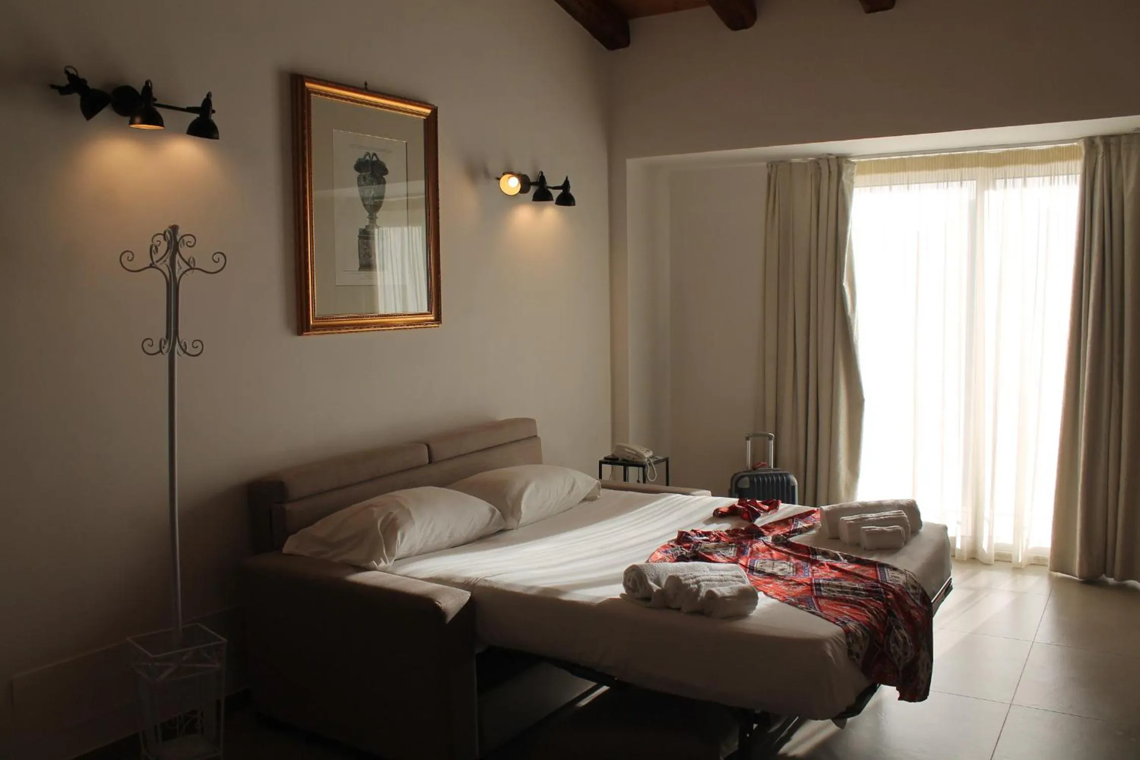 Living room, Bed in Don Vittorio Country Village