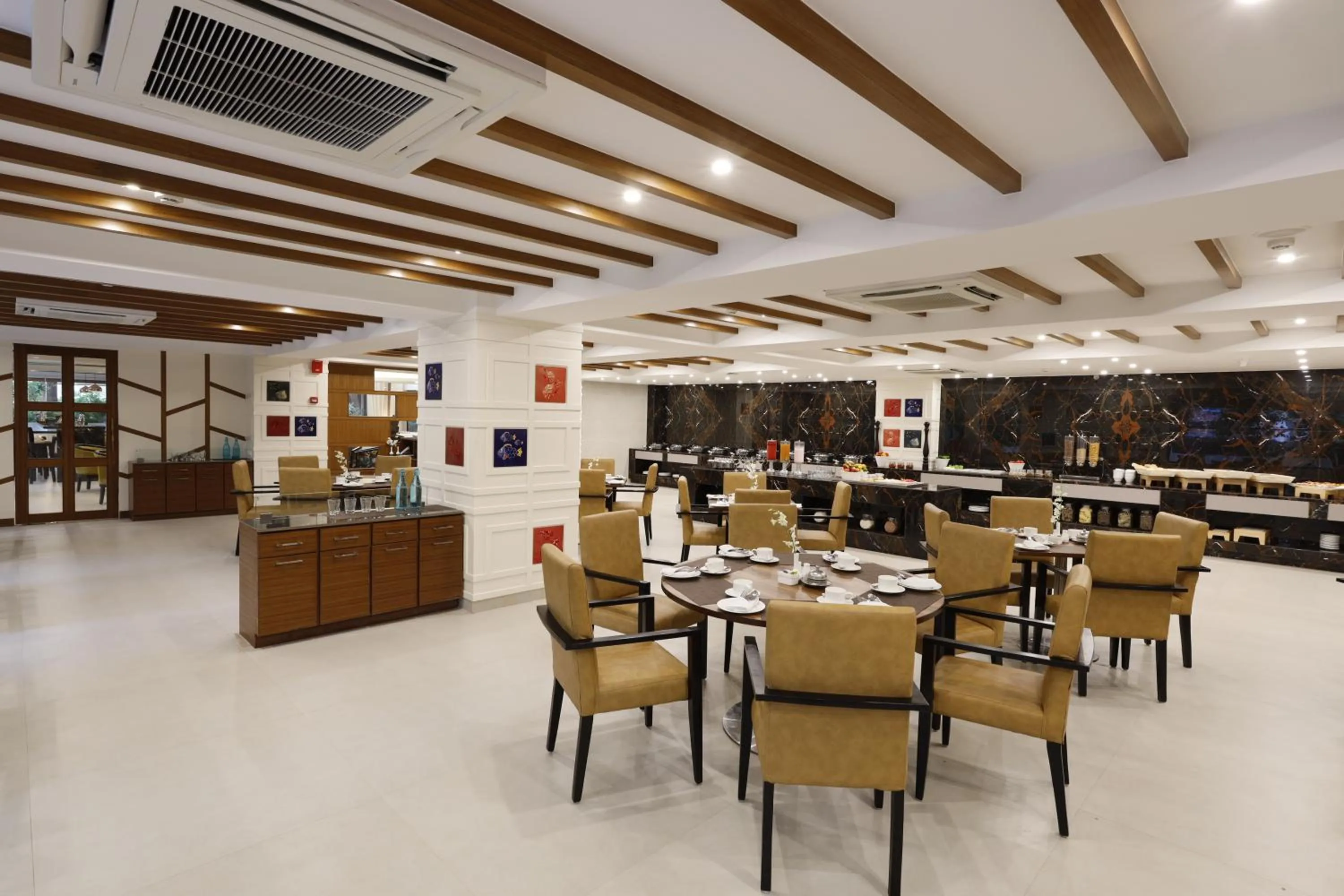 Restaurant/places to eat in Sobit Sarovar Portico
