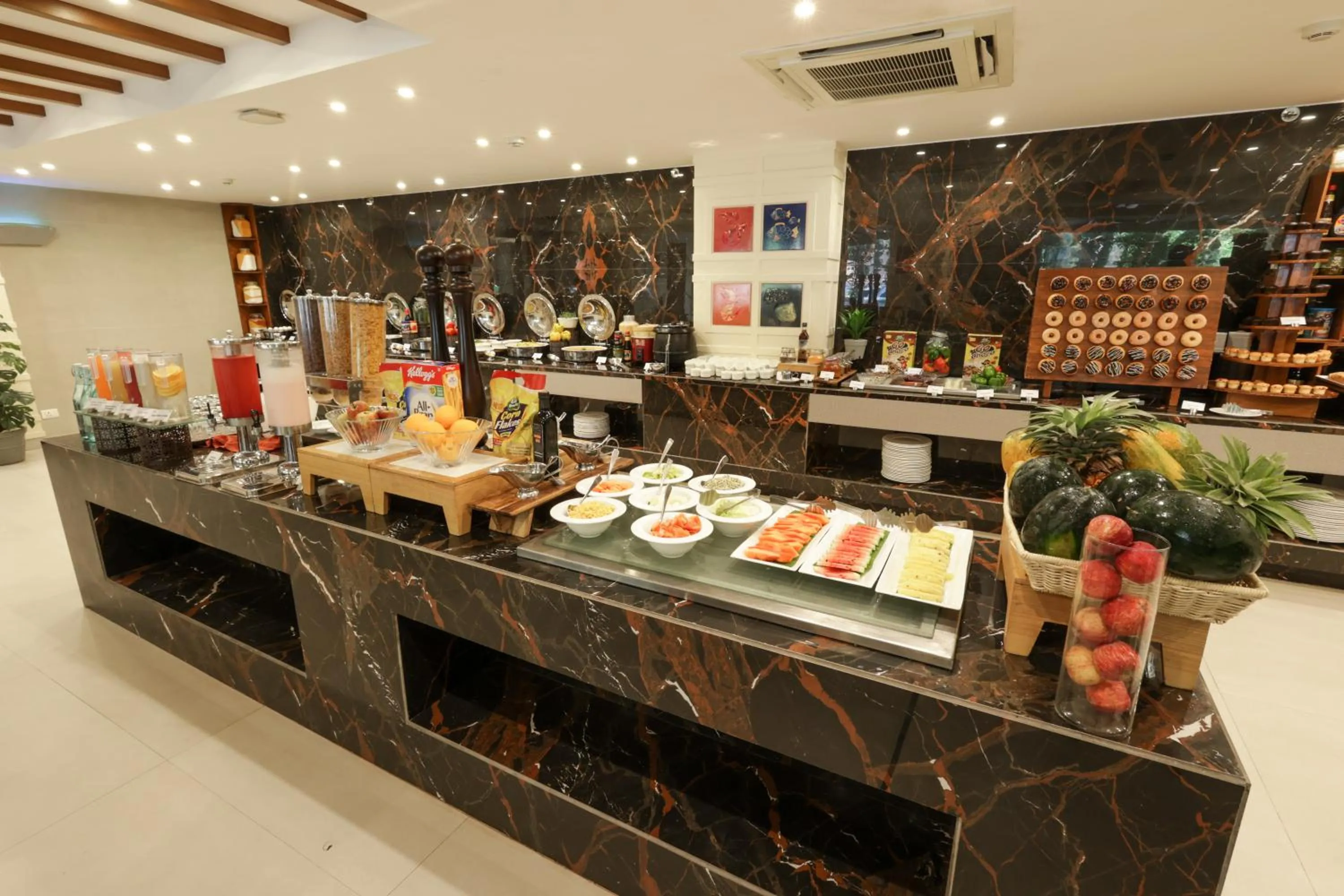 Restaurant/places to eat in Sobit Sarovar Portico