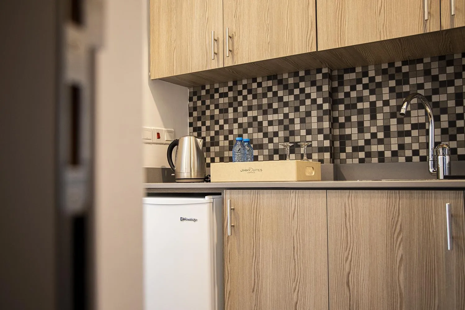 Kitchen or kitchenette in Jimmy's Suites