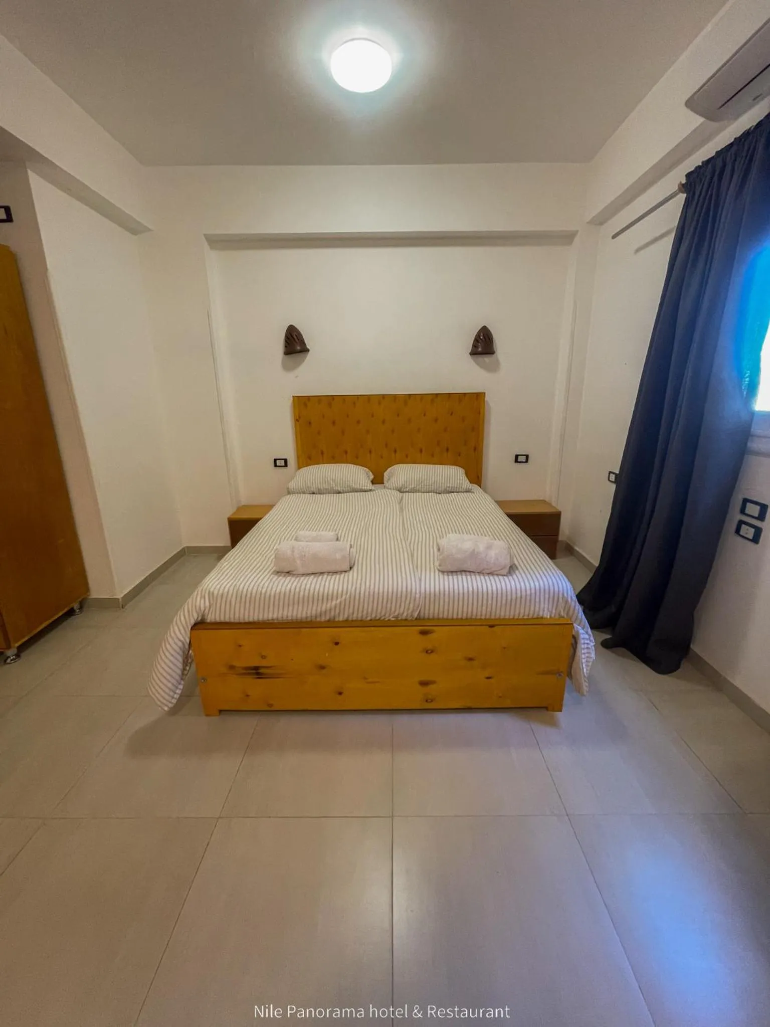 Bed in Nile Panorama Hotel & Restaurant