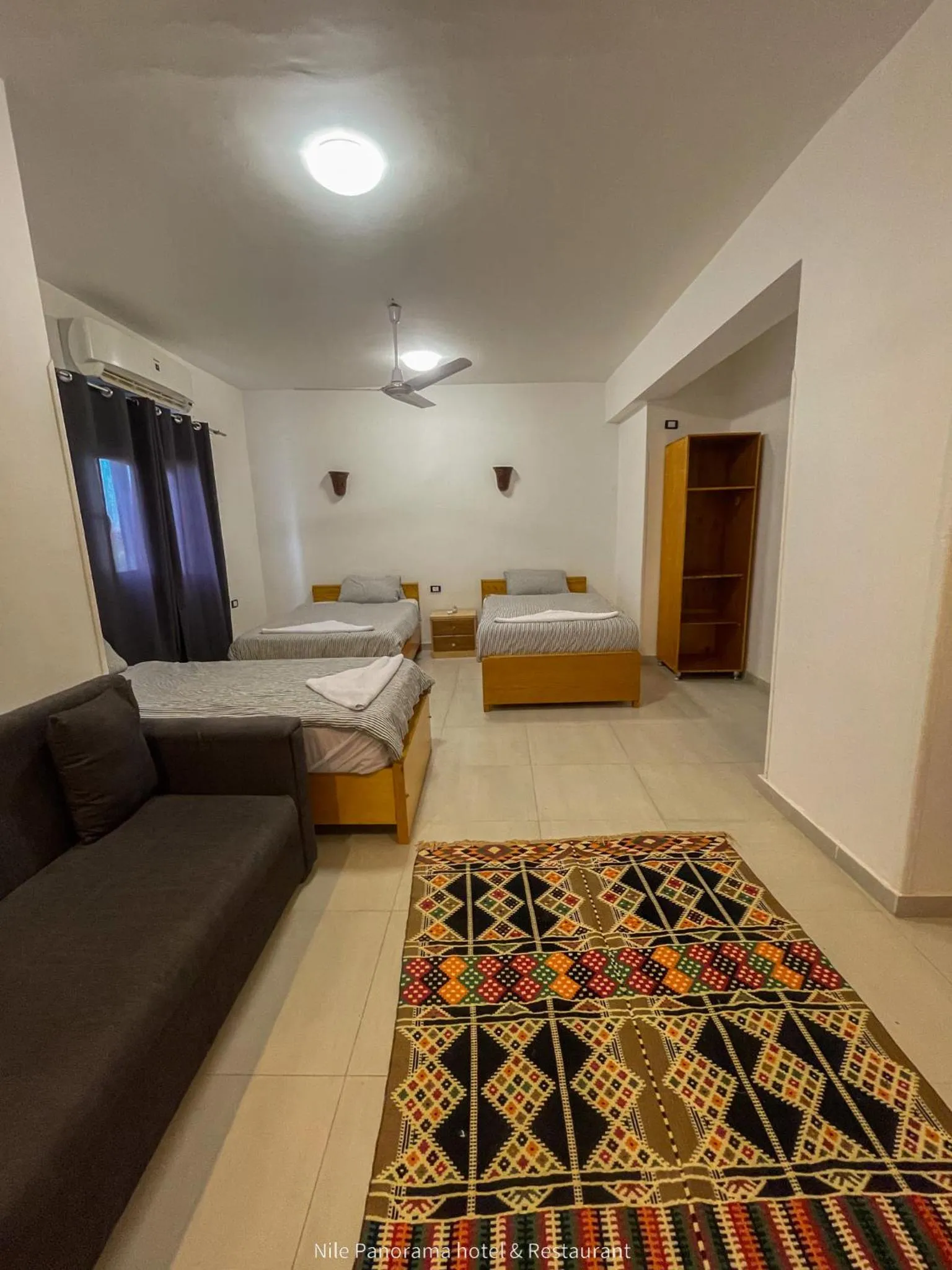 Photo of the whole room, Bed in Nile Panorama Hotel & Restaurant