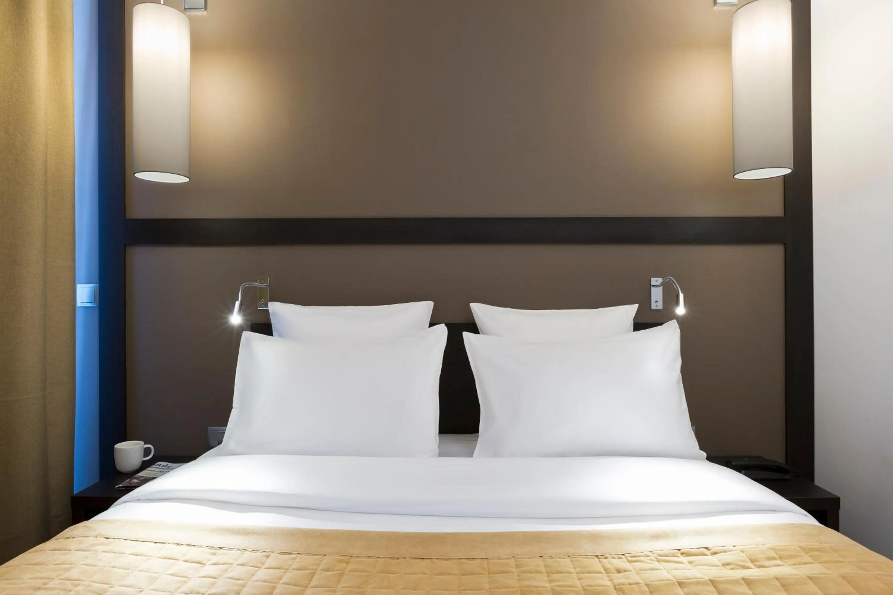 Bed in Simon's Boutique Hôtel