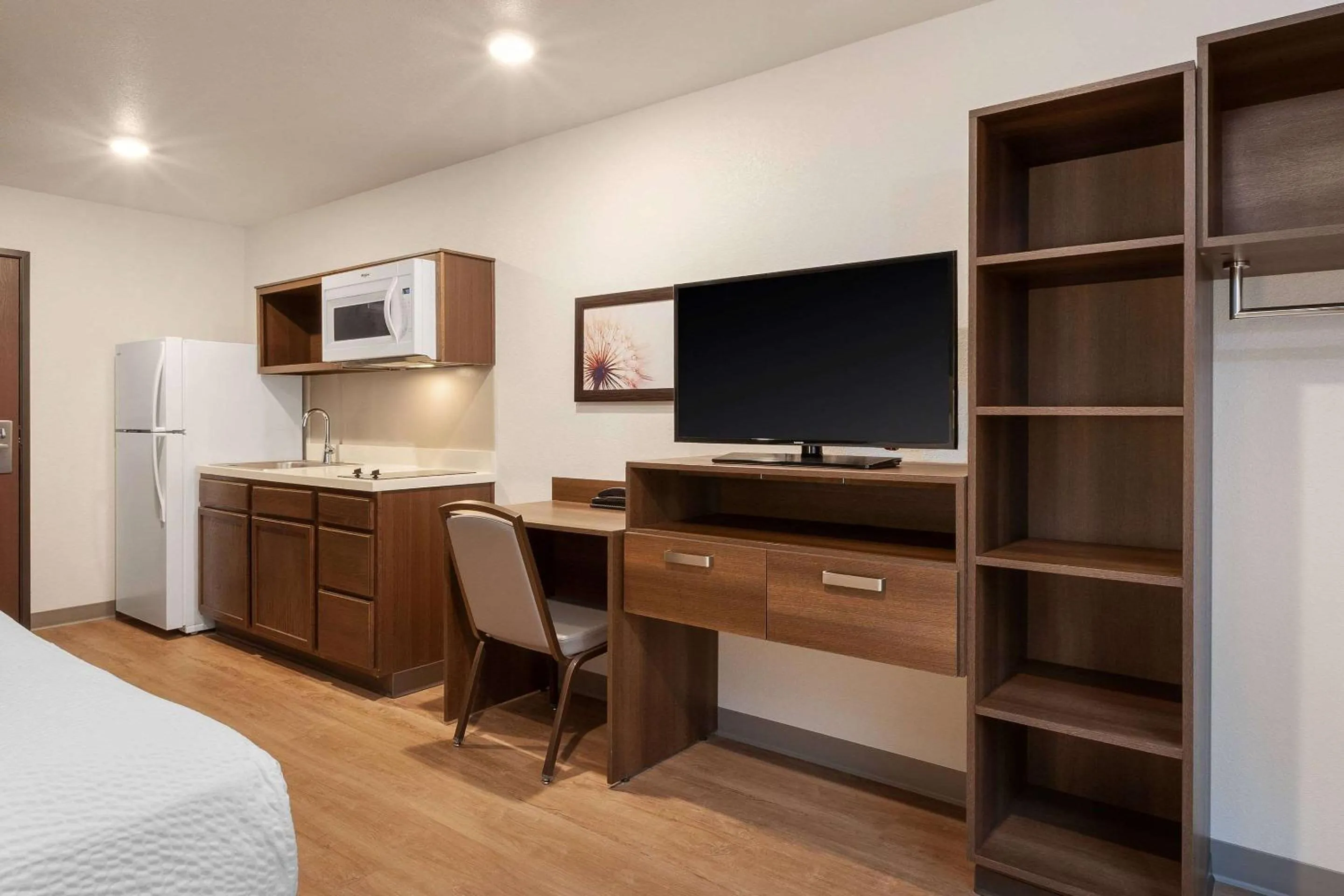 Photo of the whole room, Bed in WoodSpring Suites Quantico