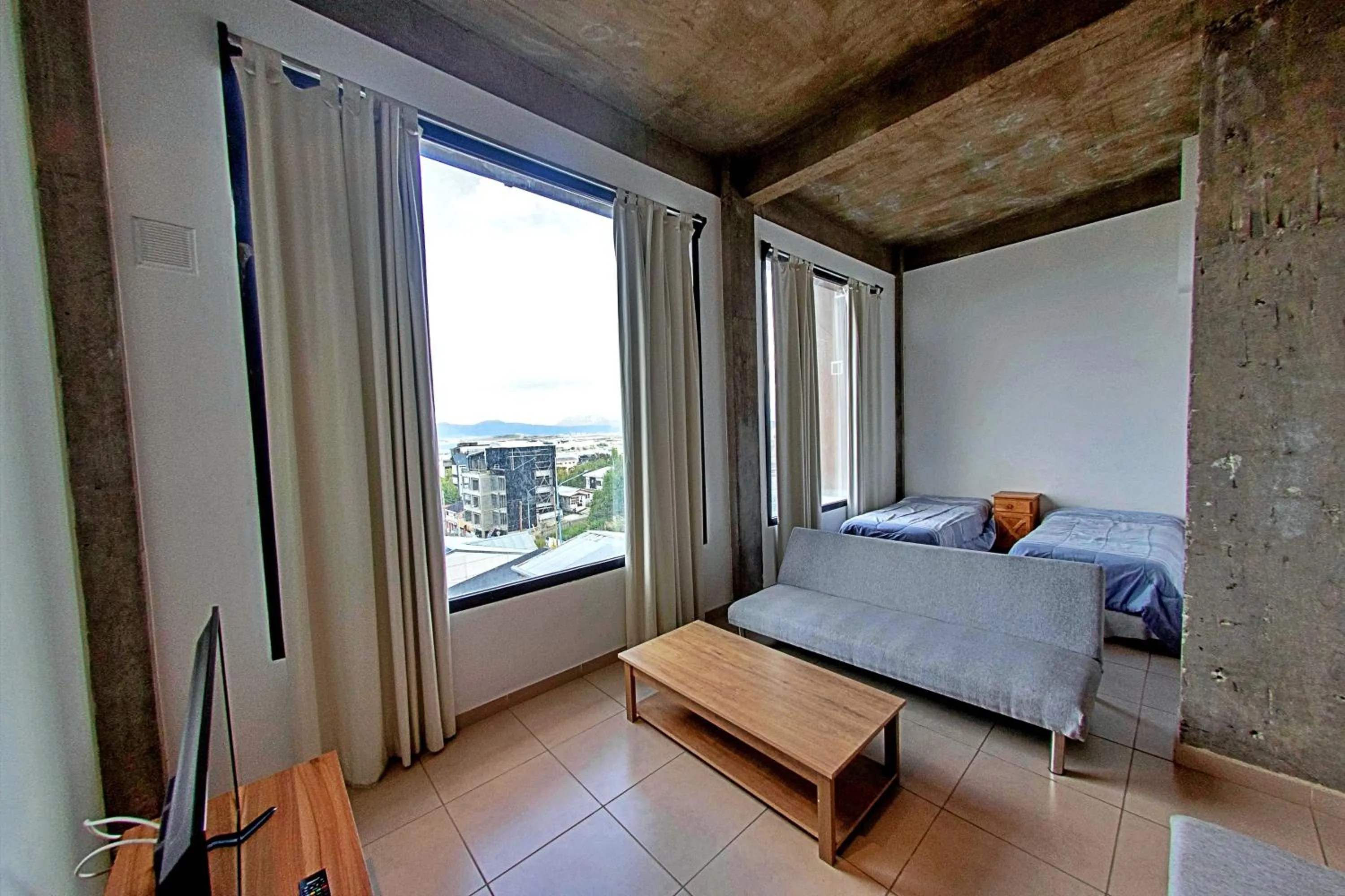 Living room, Bed in Patagonia Home