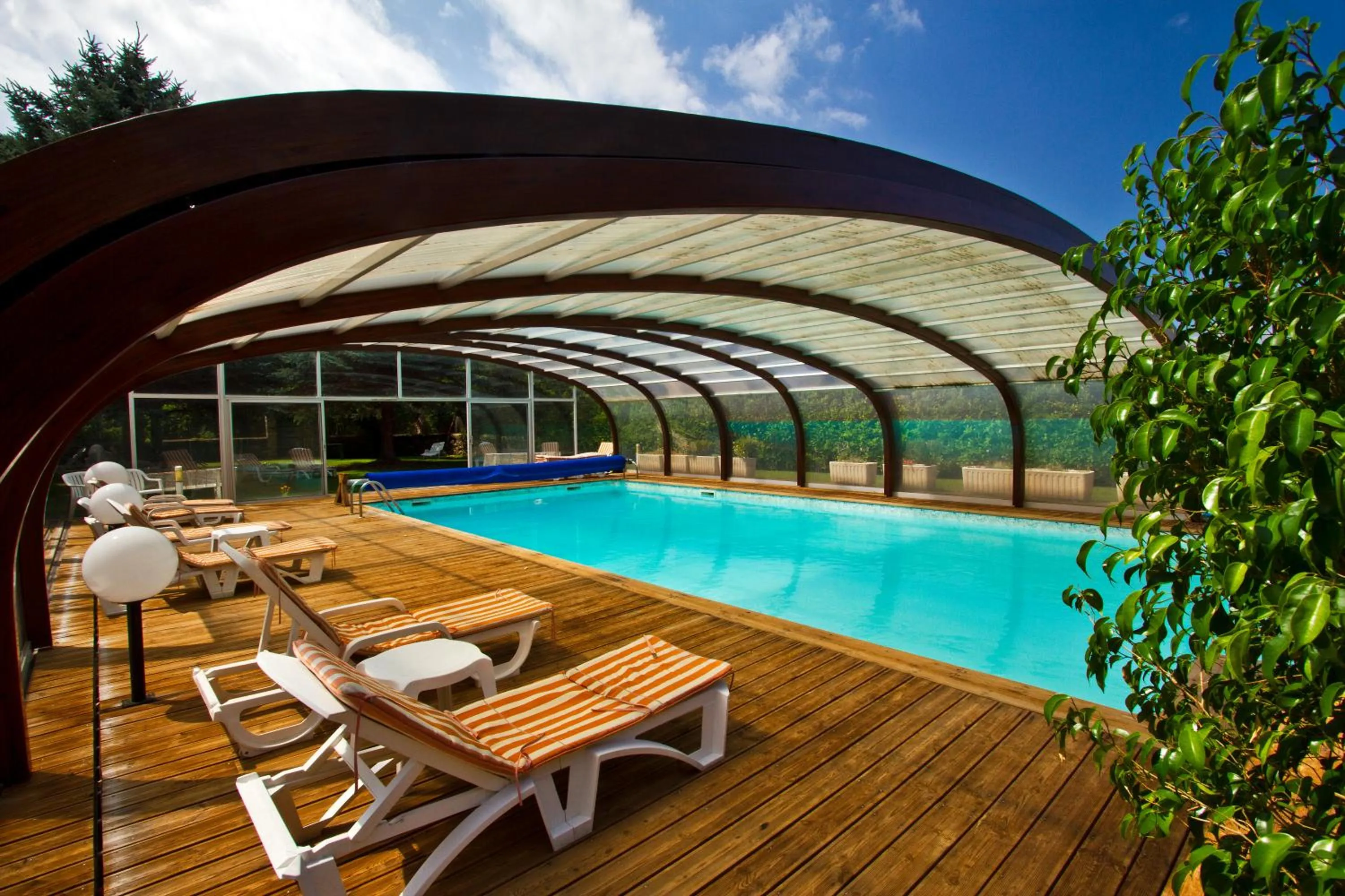 Swimming pool in Logis Hotel Restaurant Planes