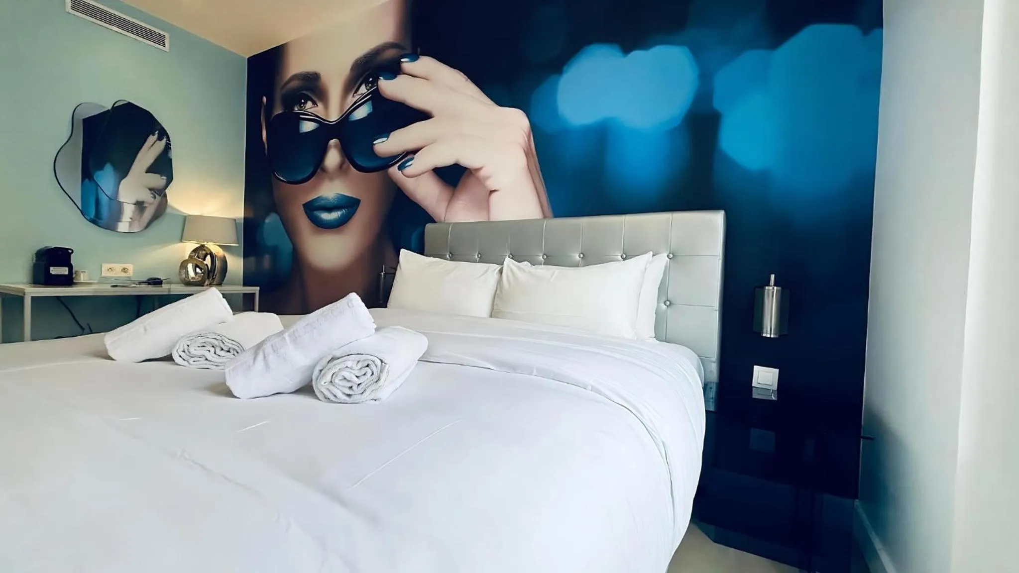 Bed in Le Glam's Hotel