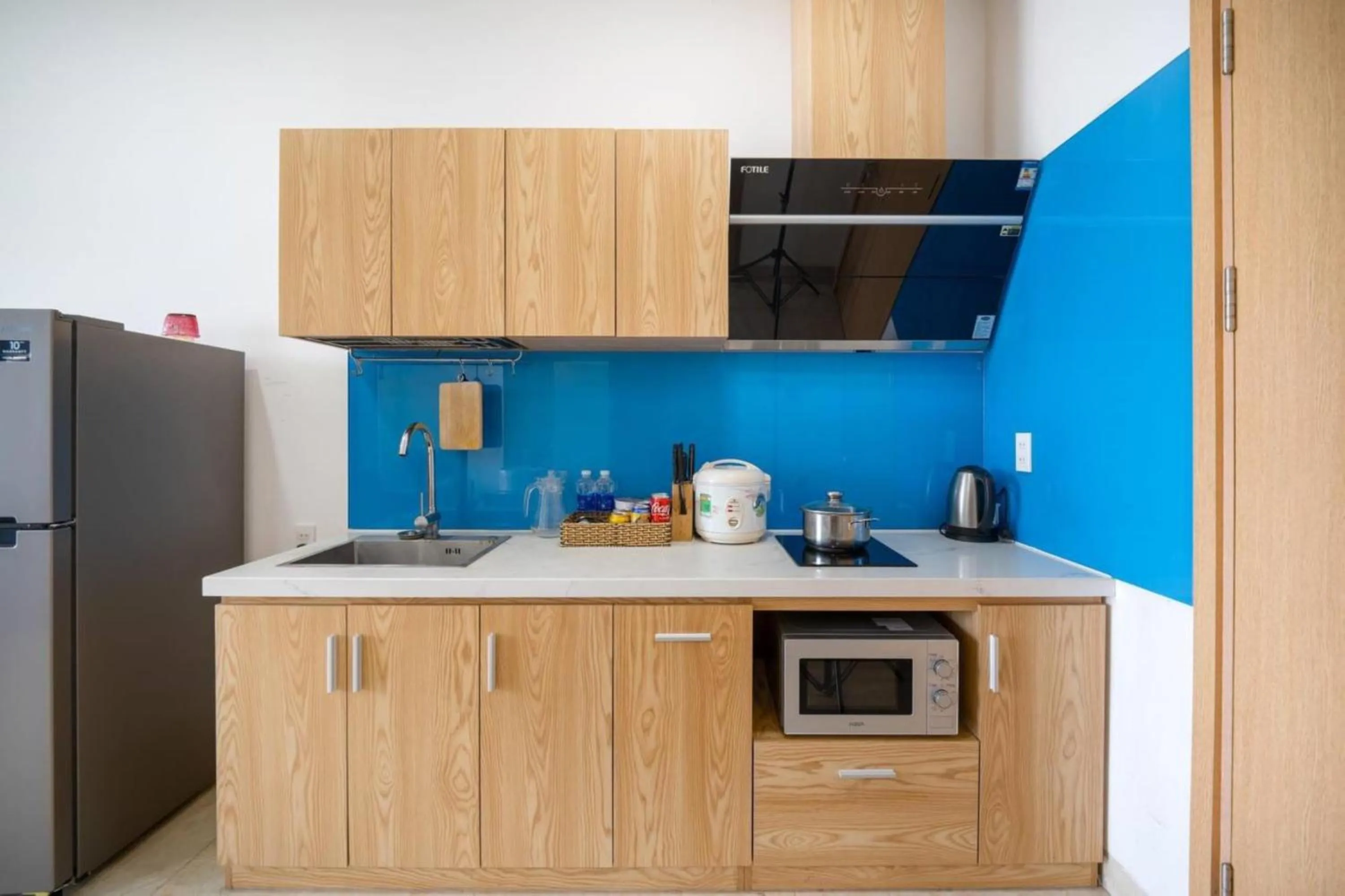 Kitchen or kitchenette in Blue-S Hotel & Apartment
