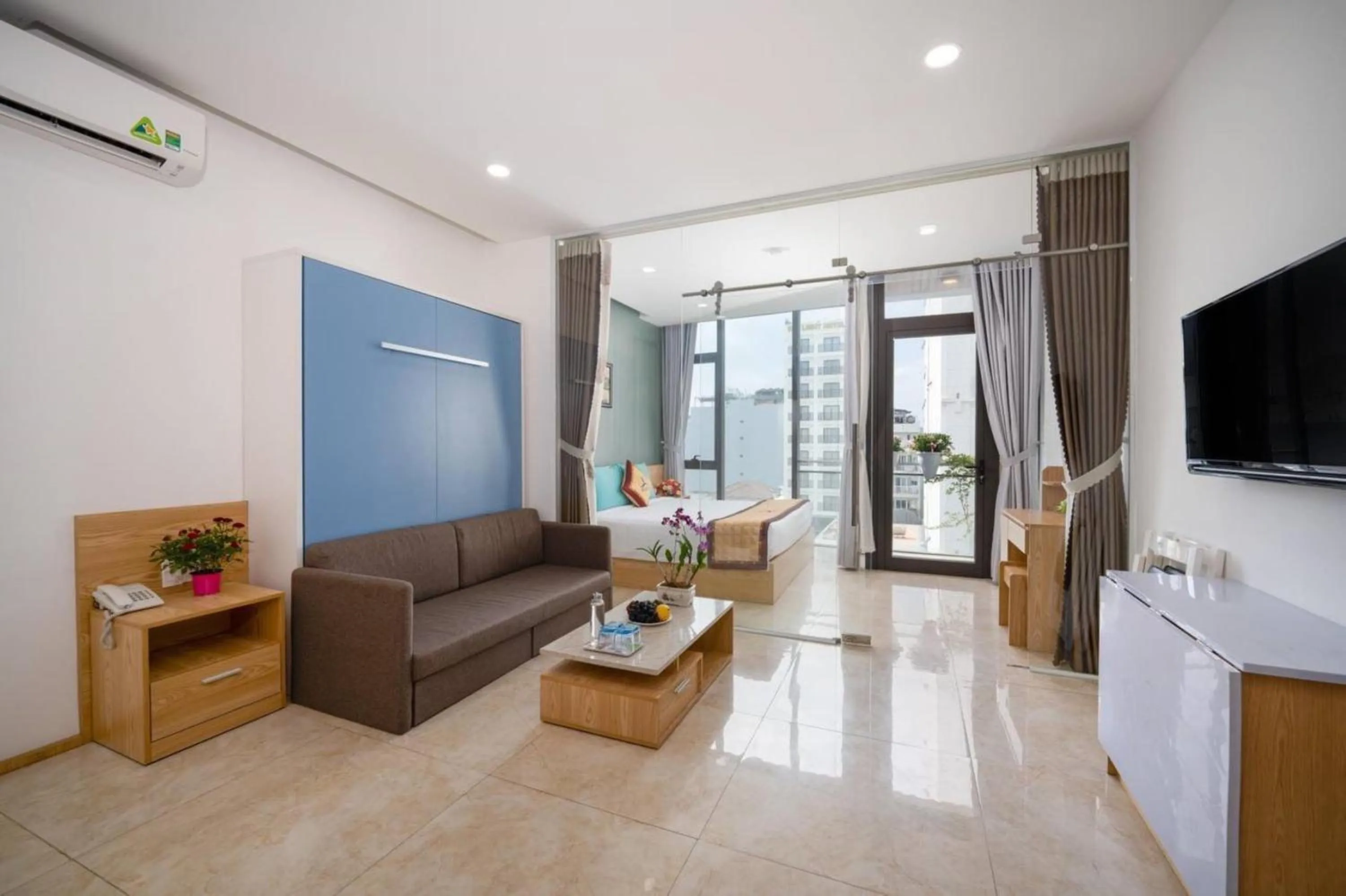 Communal lounge/ TV room in Blue-S Hotel & Apartment