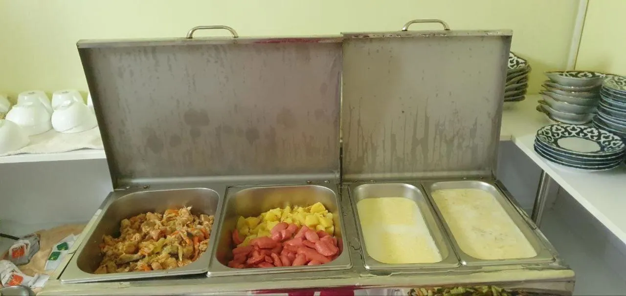 Kitchen or kitchenette in Samarkand City Center Hotel