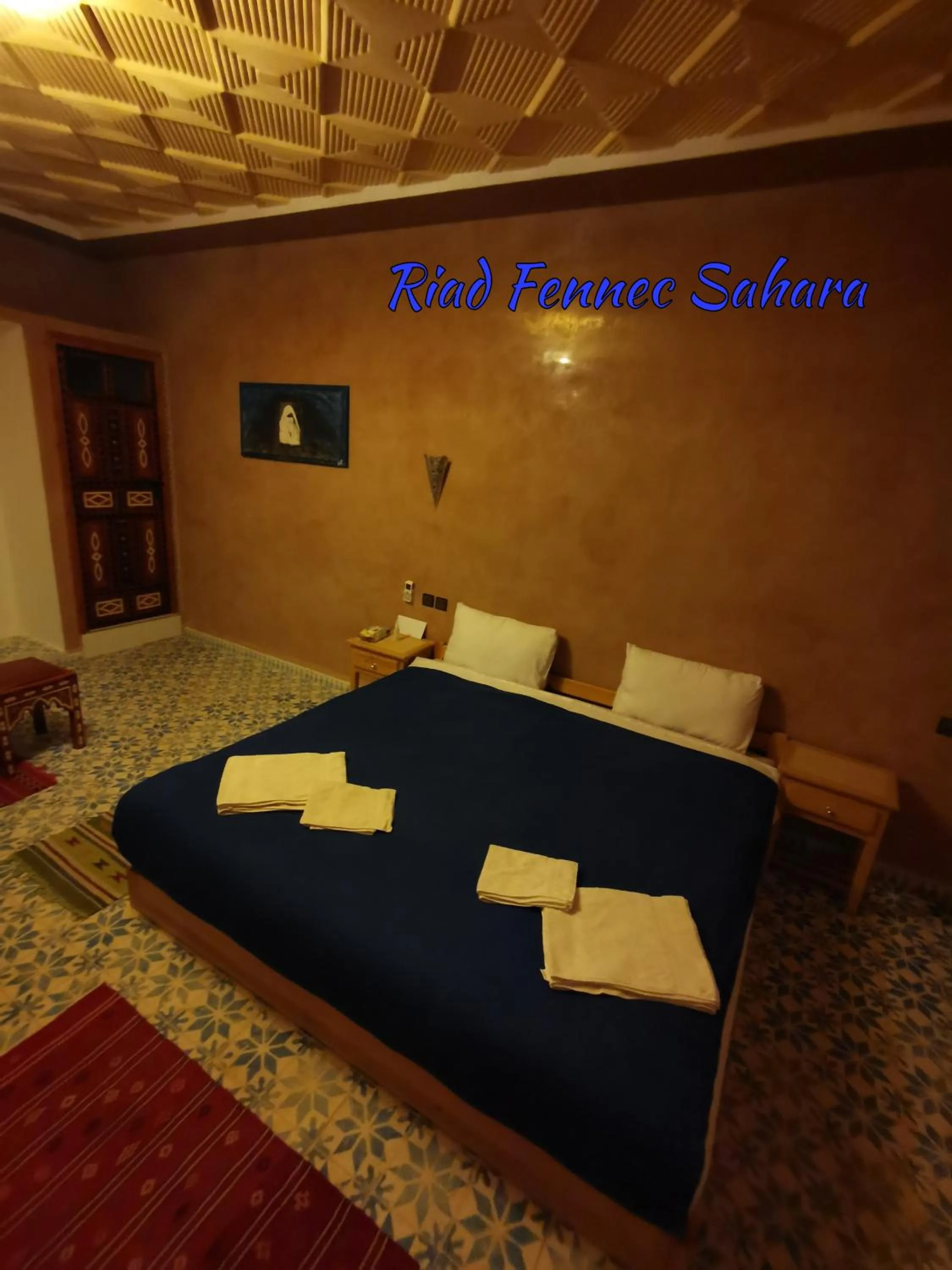 Bed in Riad Fennec Sahara