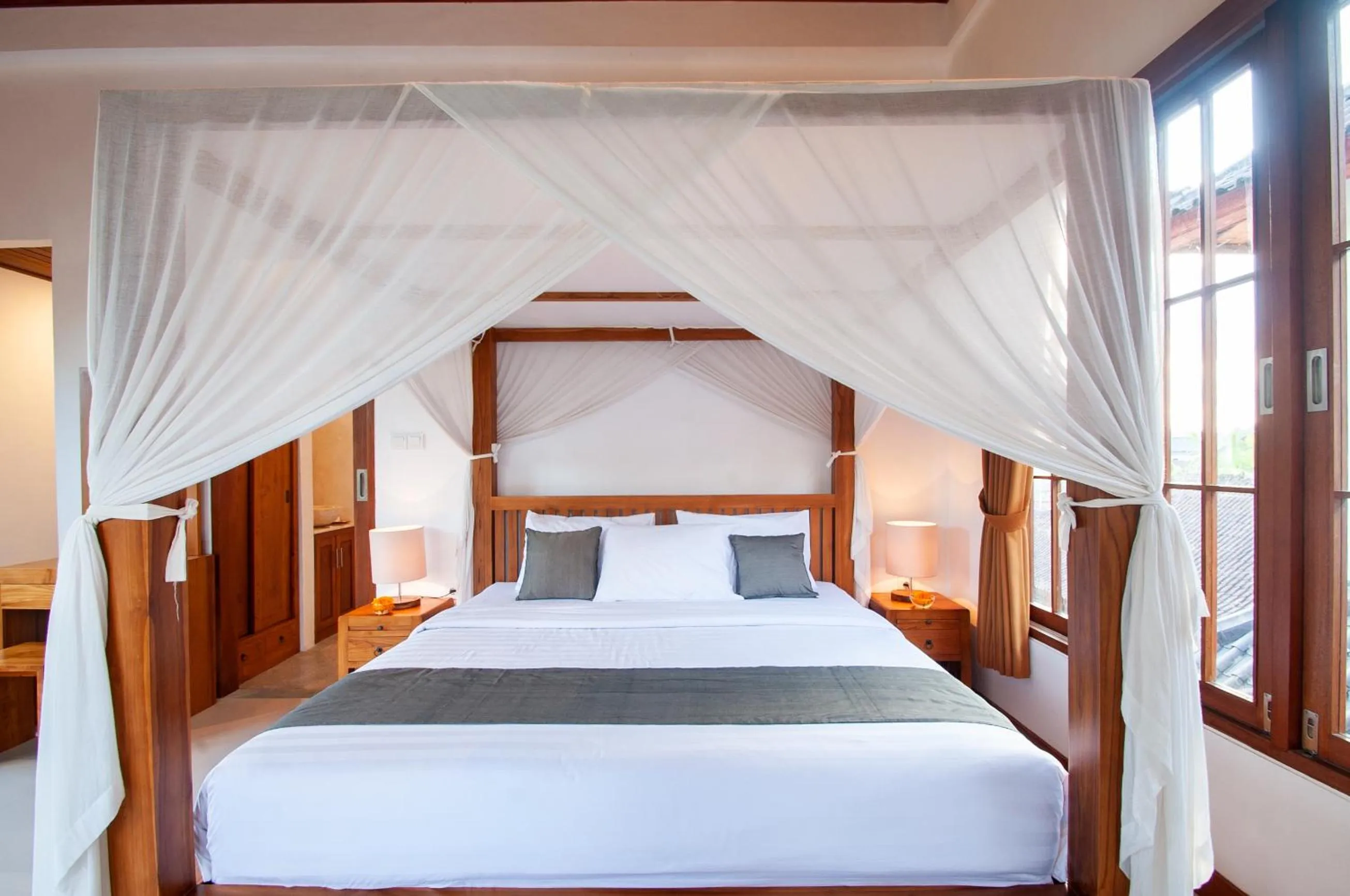 Bed in Flamboyant Villa Ubud