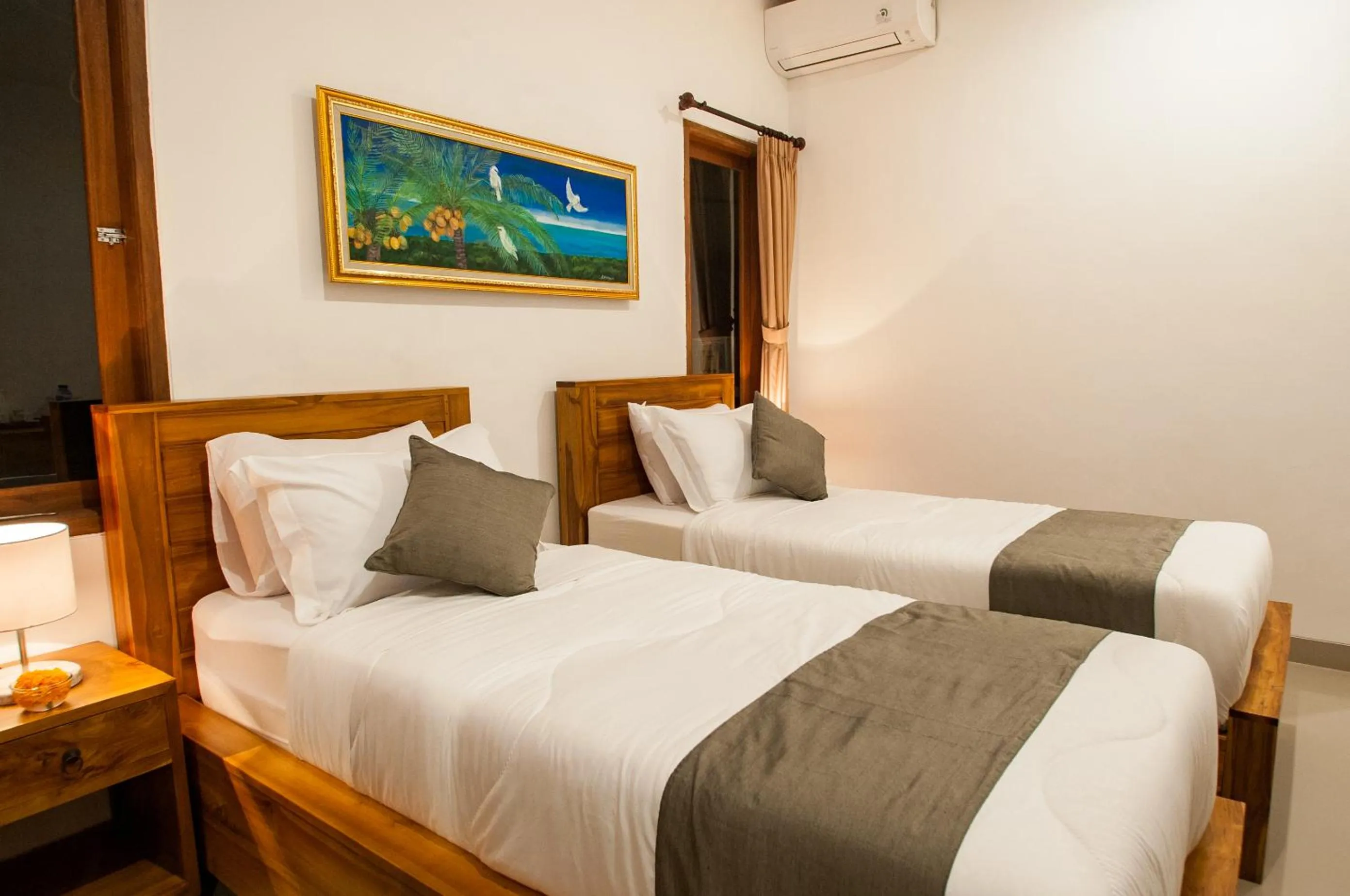 Bed in Flamboyant Villa Ubud