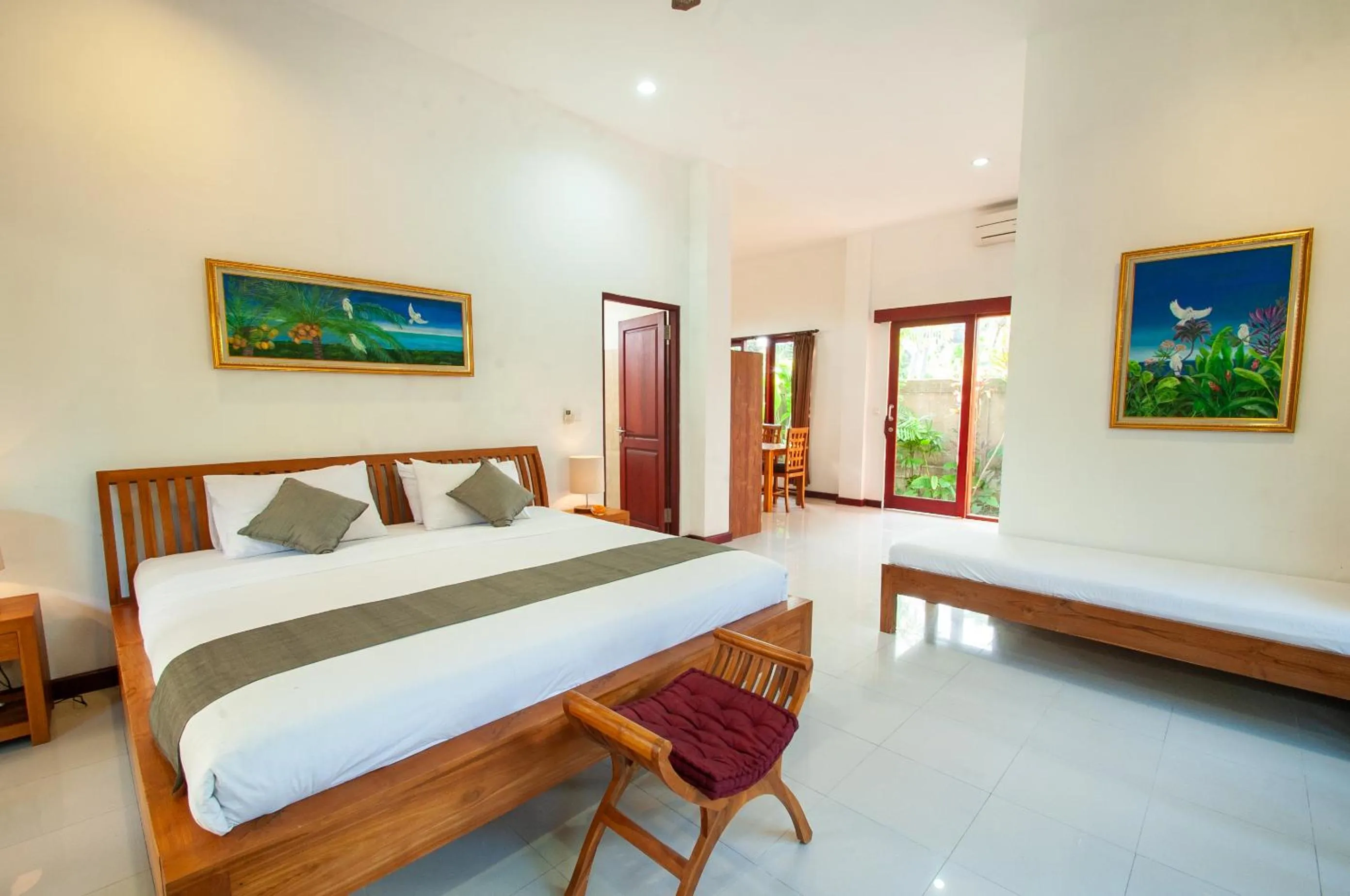 Bed in Flamboyant Villa Ubud