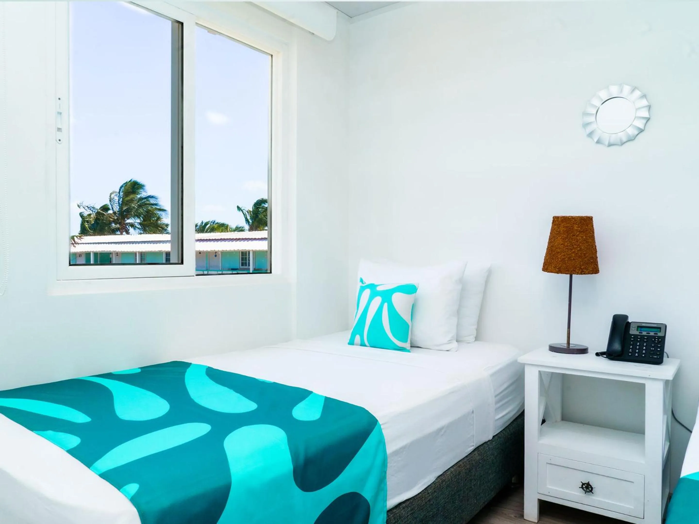 Bed in Hotel Caribbean Coral