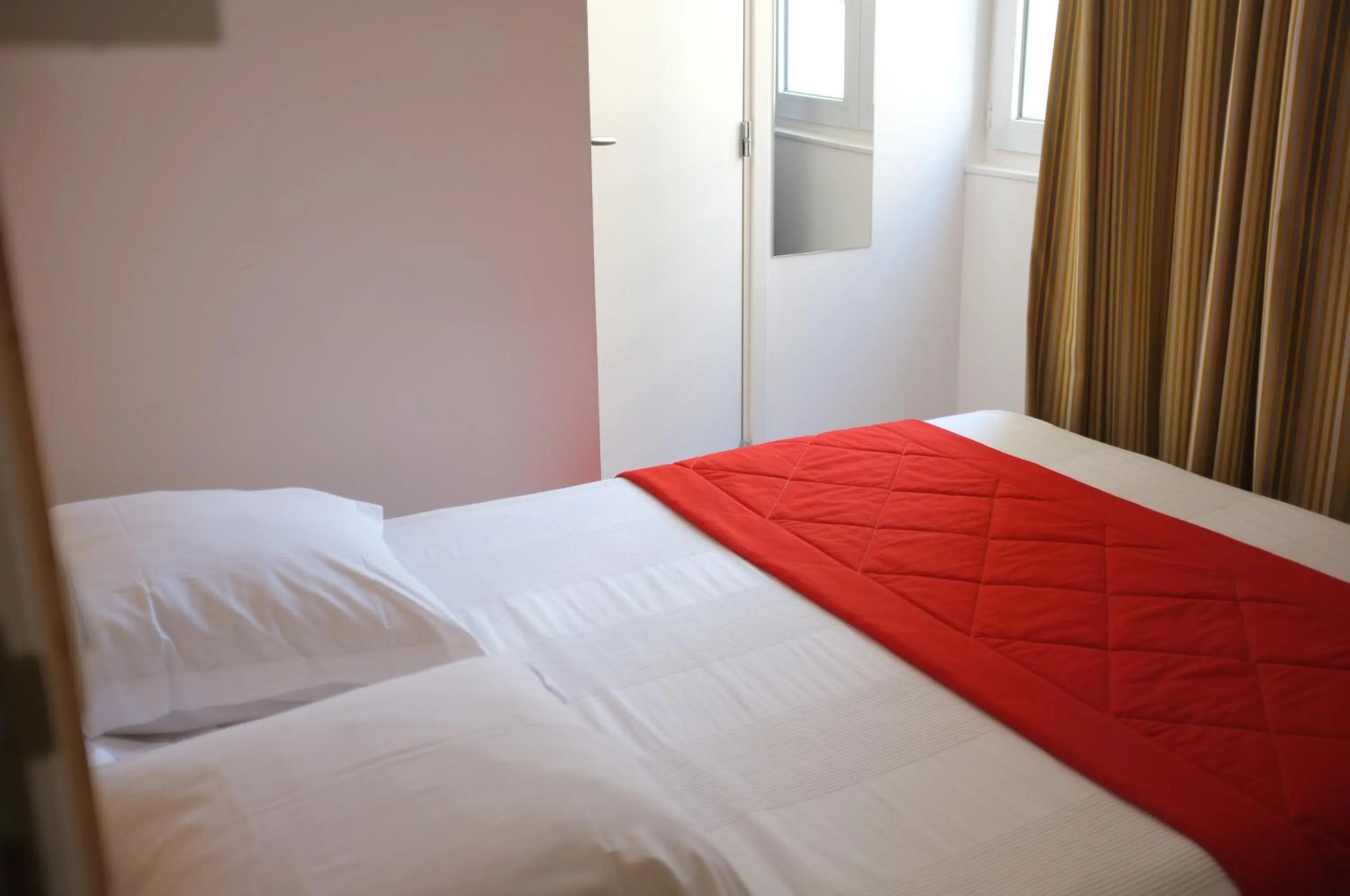 Bed in Hôtel Hermès