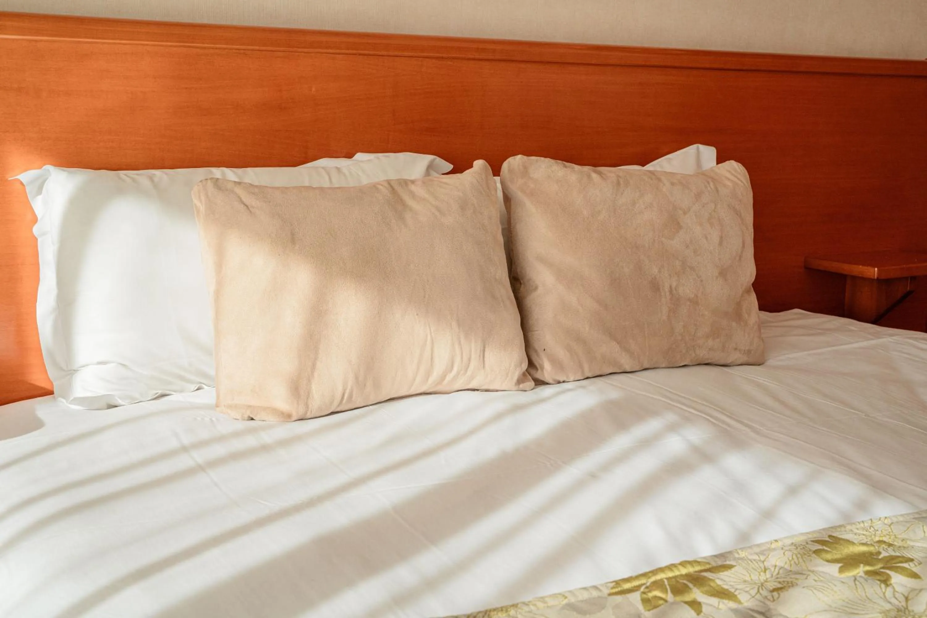 Bed in Logis Hotel Diana