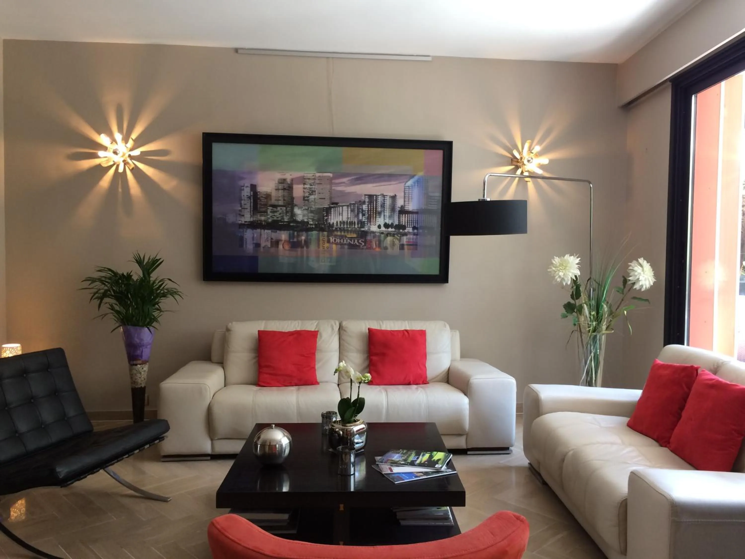 Communal lounge/ TV room in Logis Hotel Diana