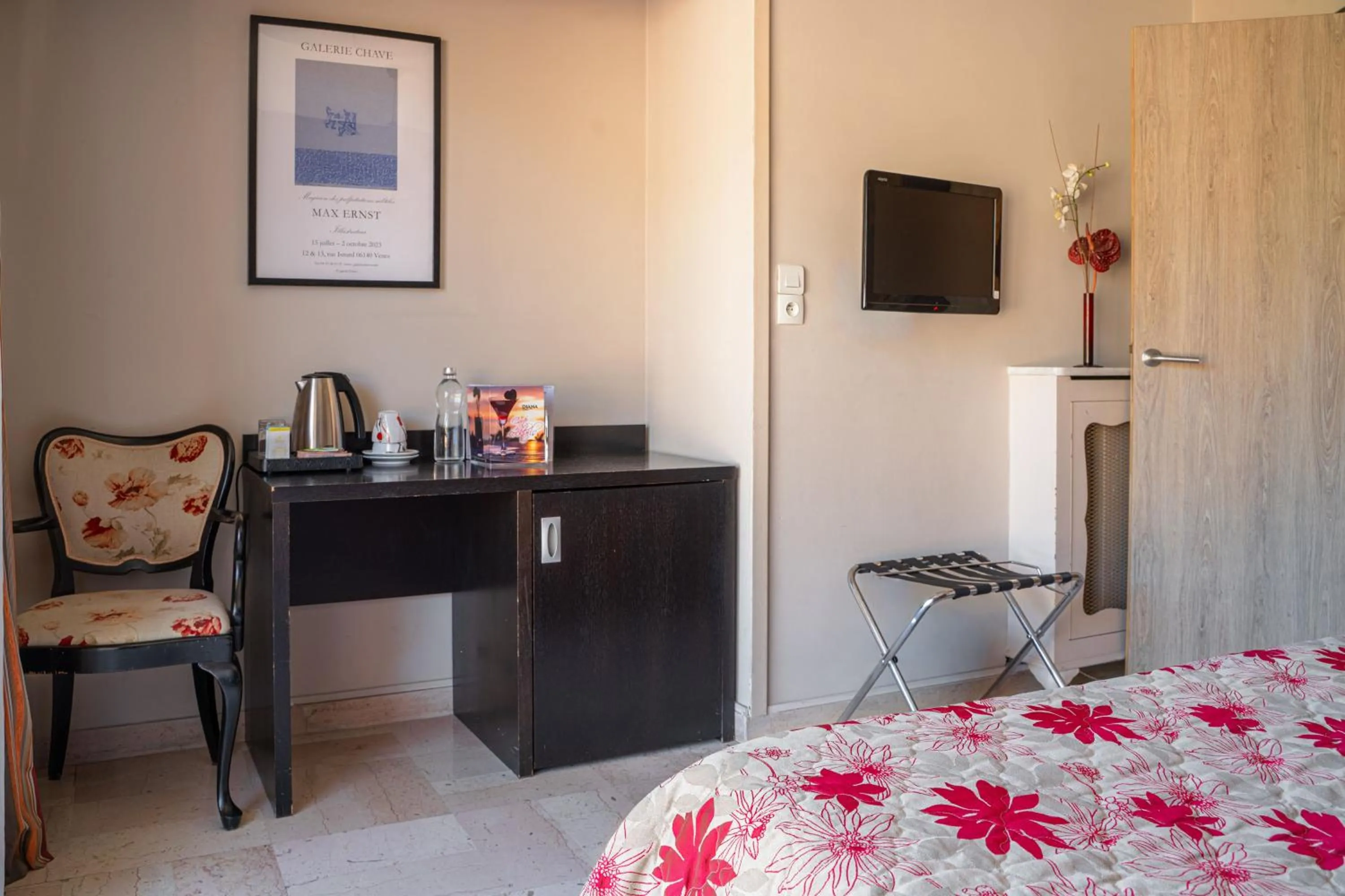 Bed in Logis Hotel Diana