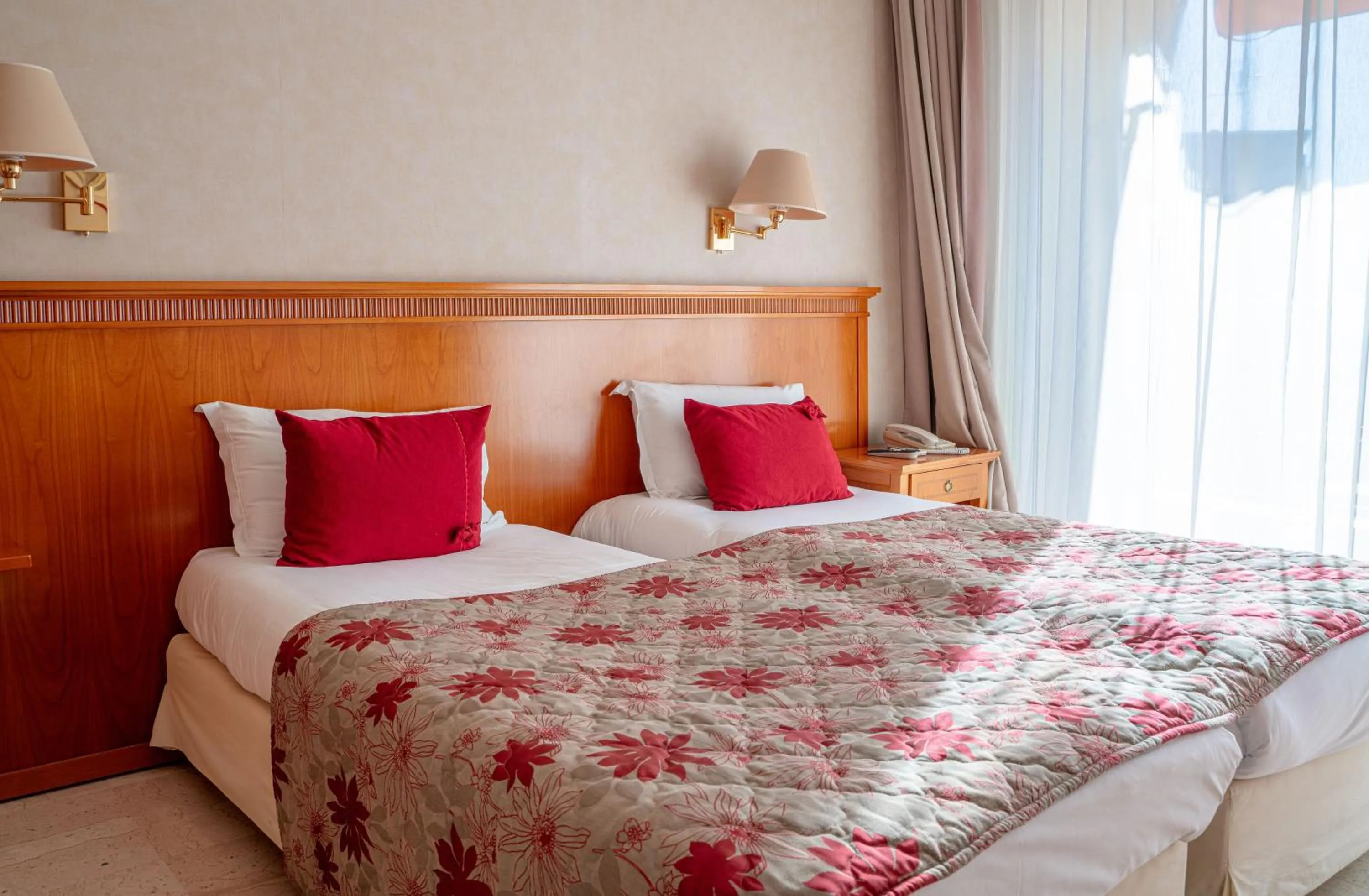 Bed in Logis Hotel Diana