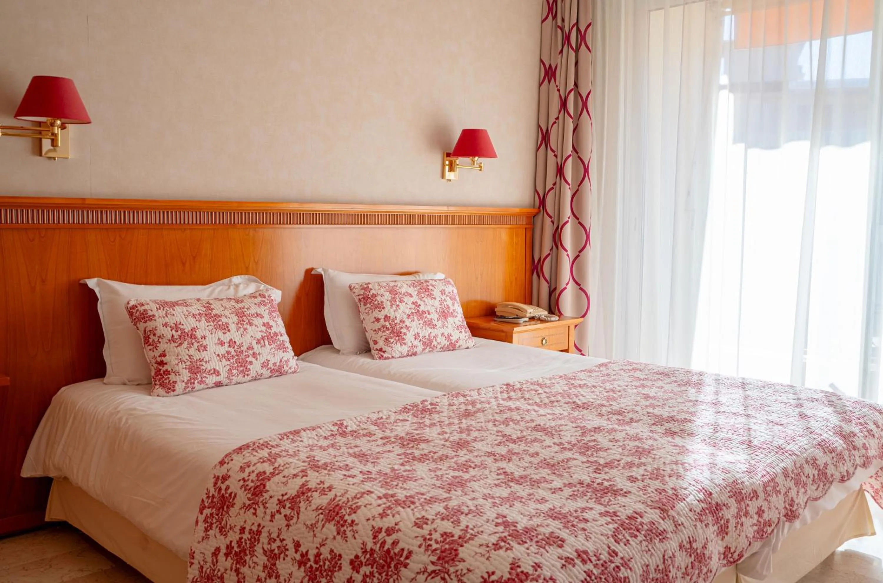 Bed in Logis Hotel Diana