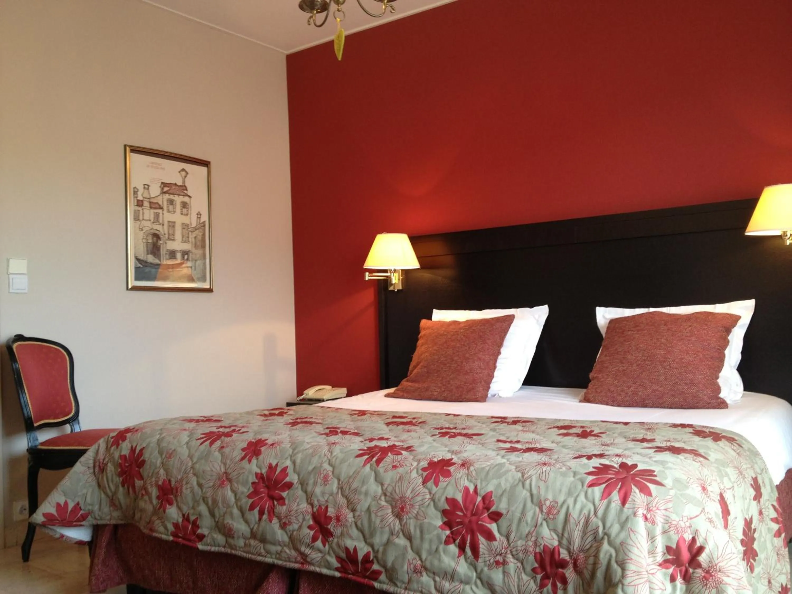 Bed in Logis Hotel Diana