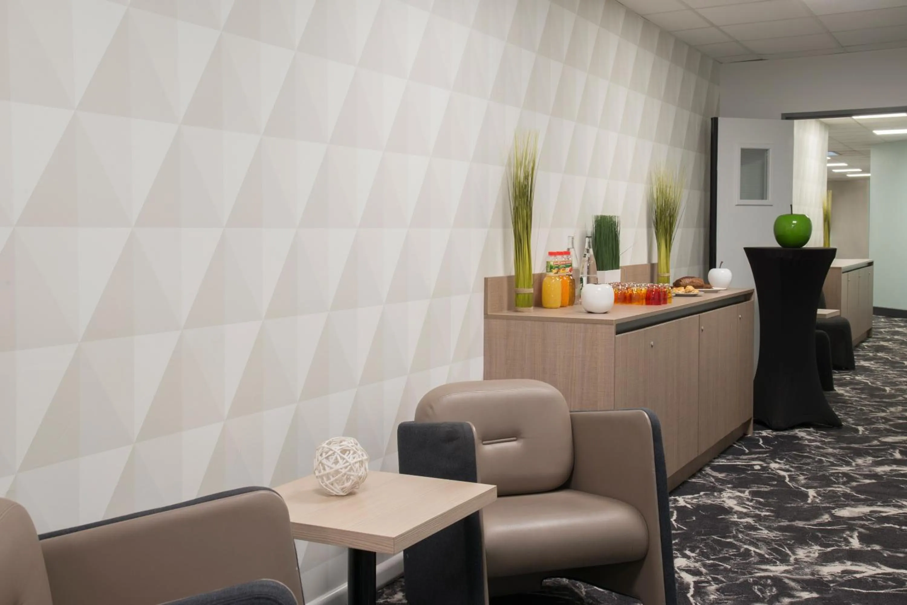 Seating area in Novotel Marseille Centre Prado Vélodrome