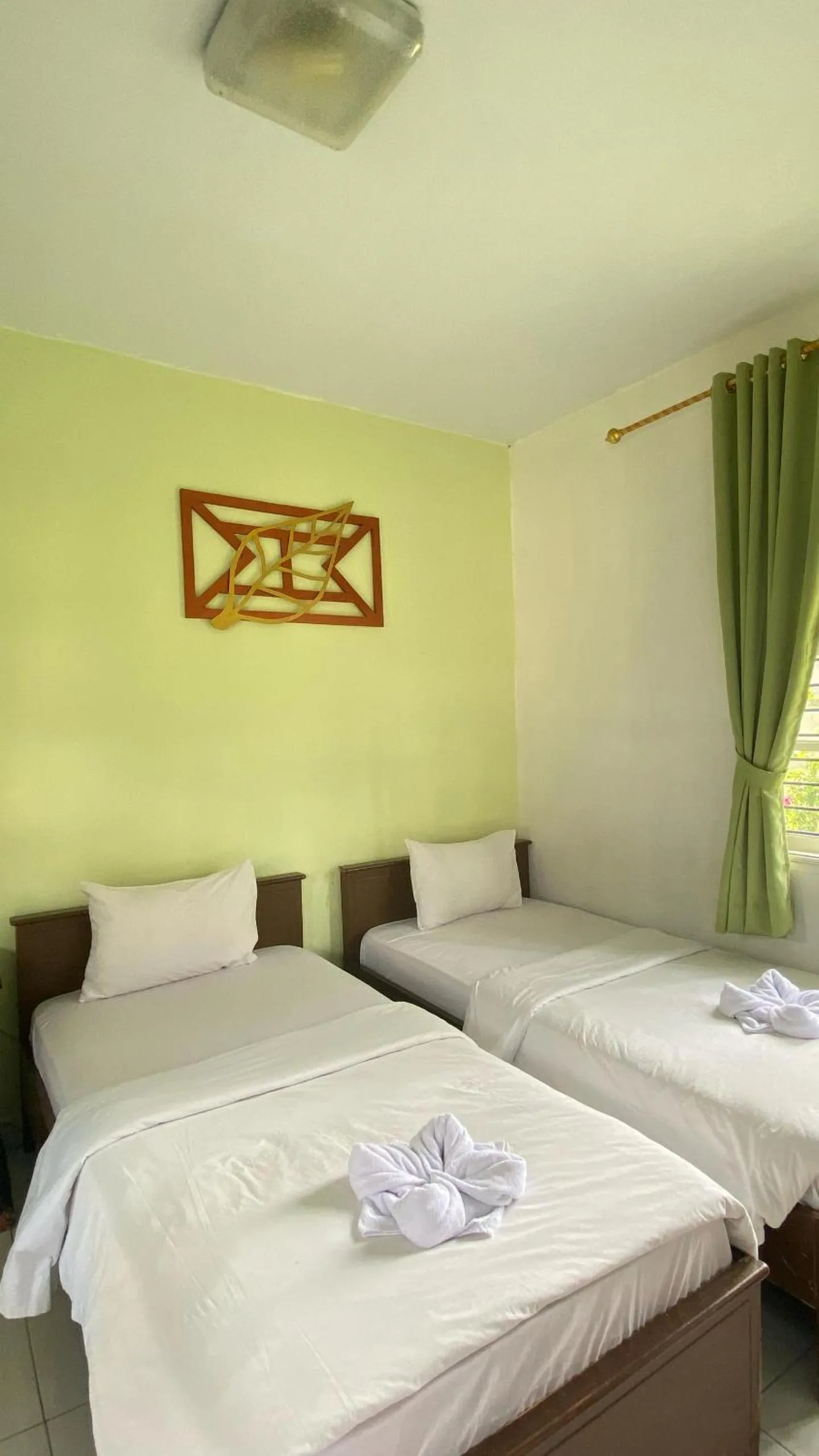 Bed in Hotel Ompu Herti