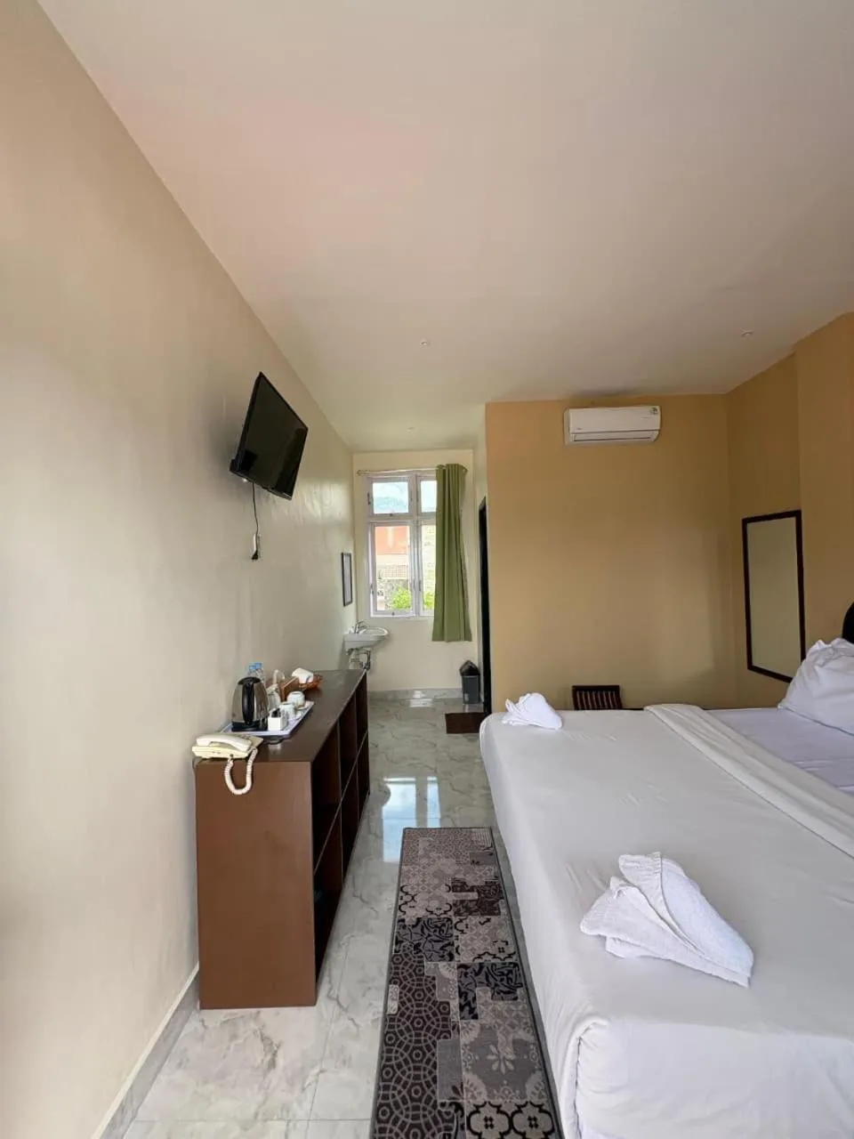 Bed in Hotel Ompu Herti