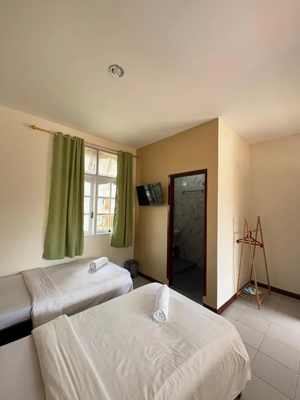 Bed in Hotel Ompu Herti