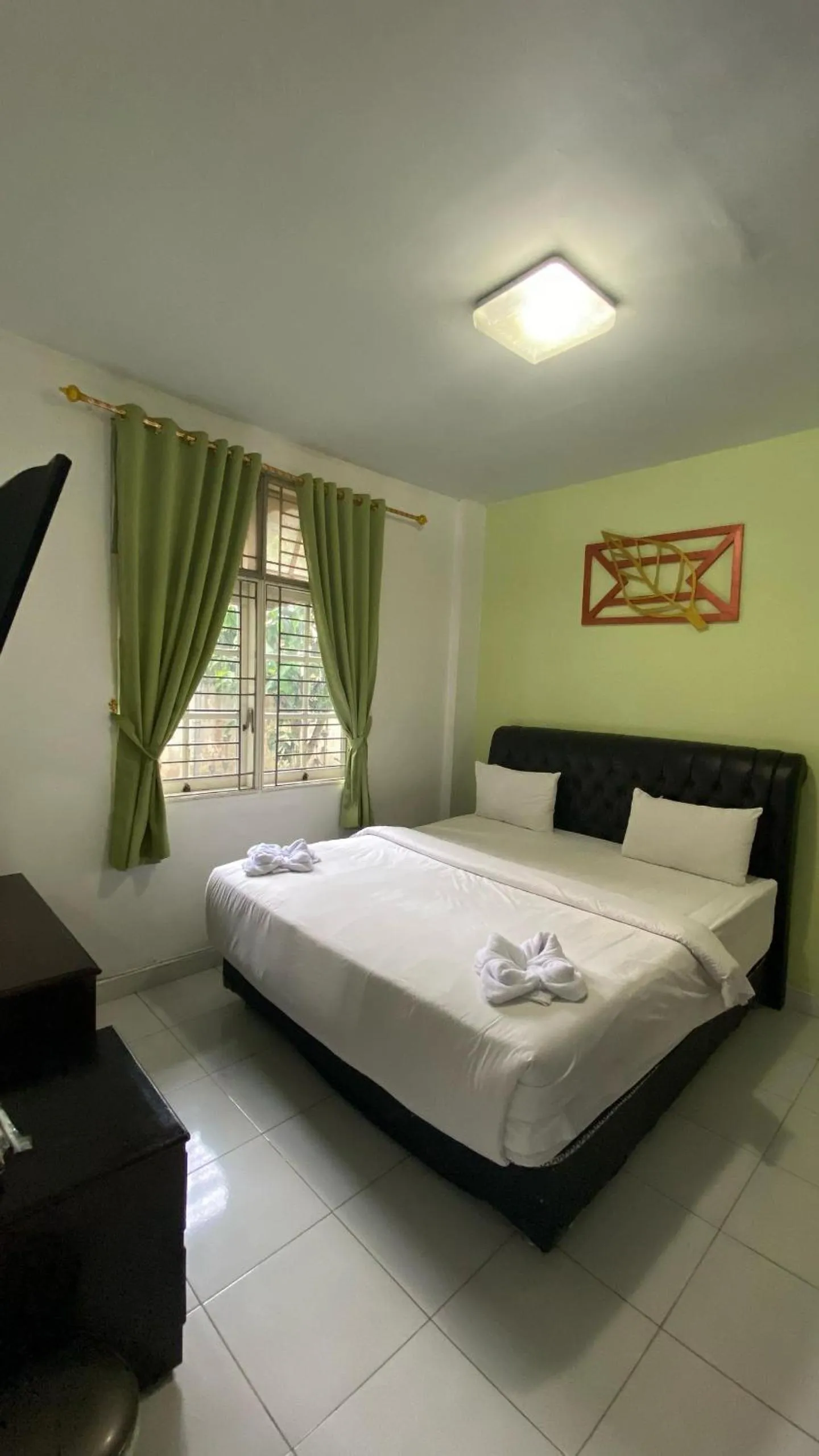 Bed in Hotel Ompu Herti