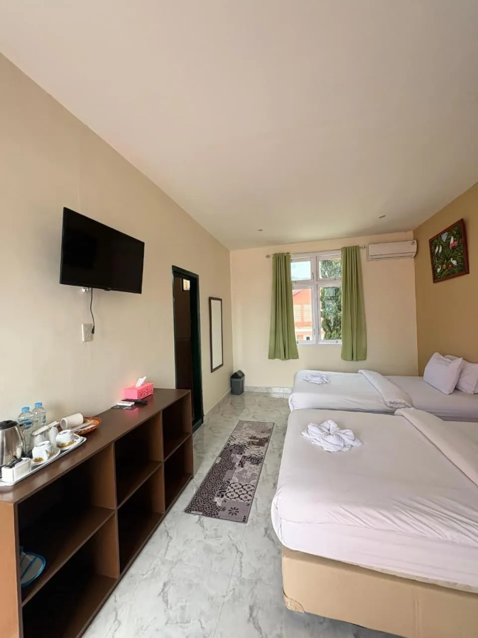 Bed in Hotel Ompu Herti