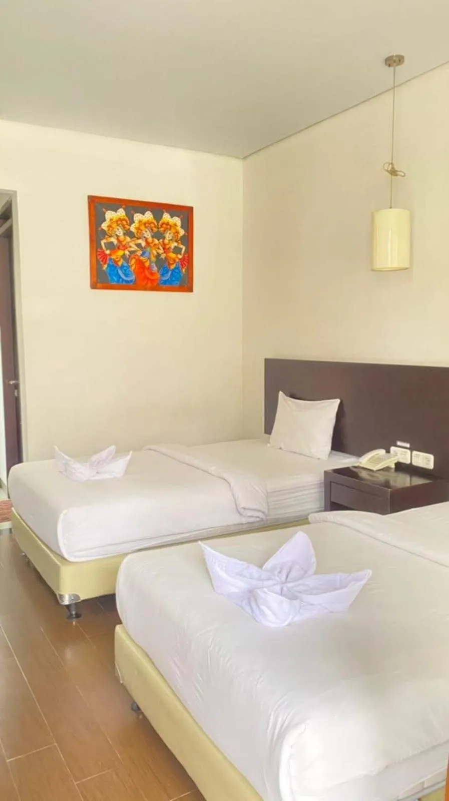 Bed in Hotel Ompu Herti