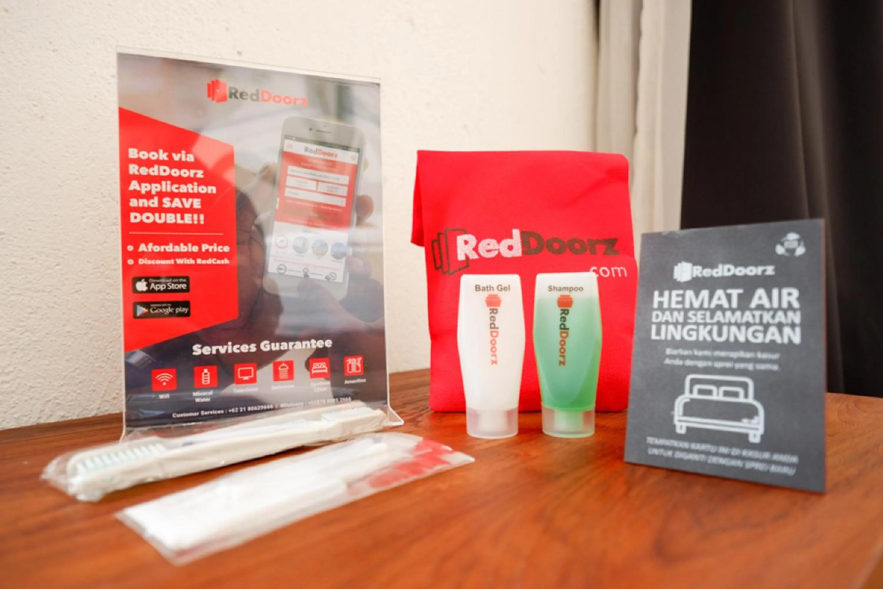 Property logo or sign in RedDoorz Syariah near Stasiun Tegal