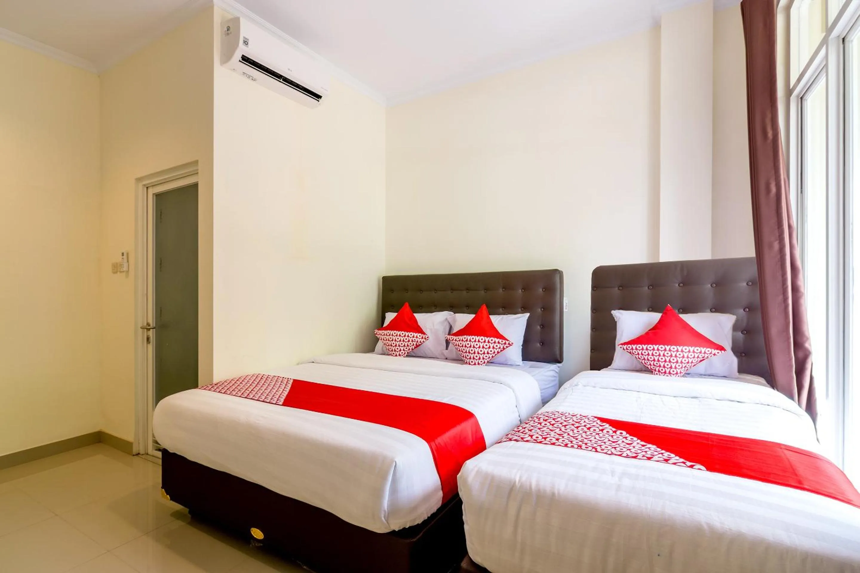 Bedroom, Bed in Hotel O Travel-inn