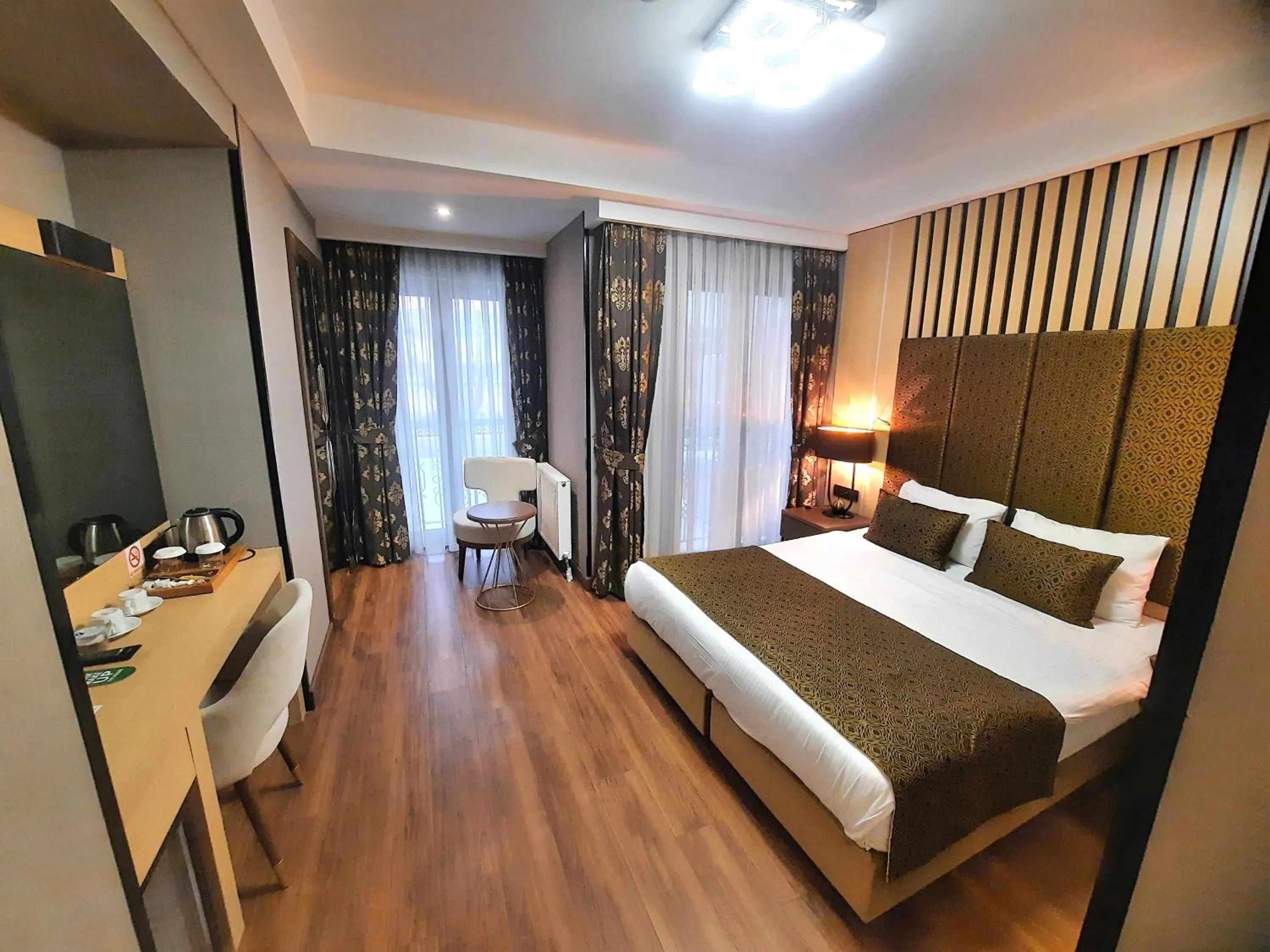 Photo of the whole room, Bed in Pell Palace Hotel & SPA