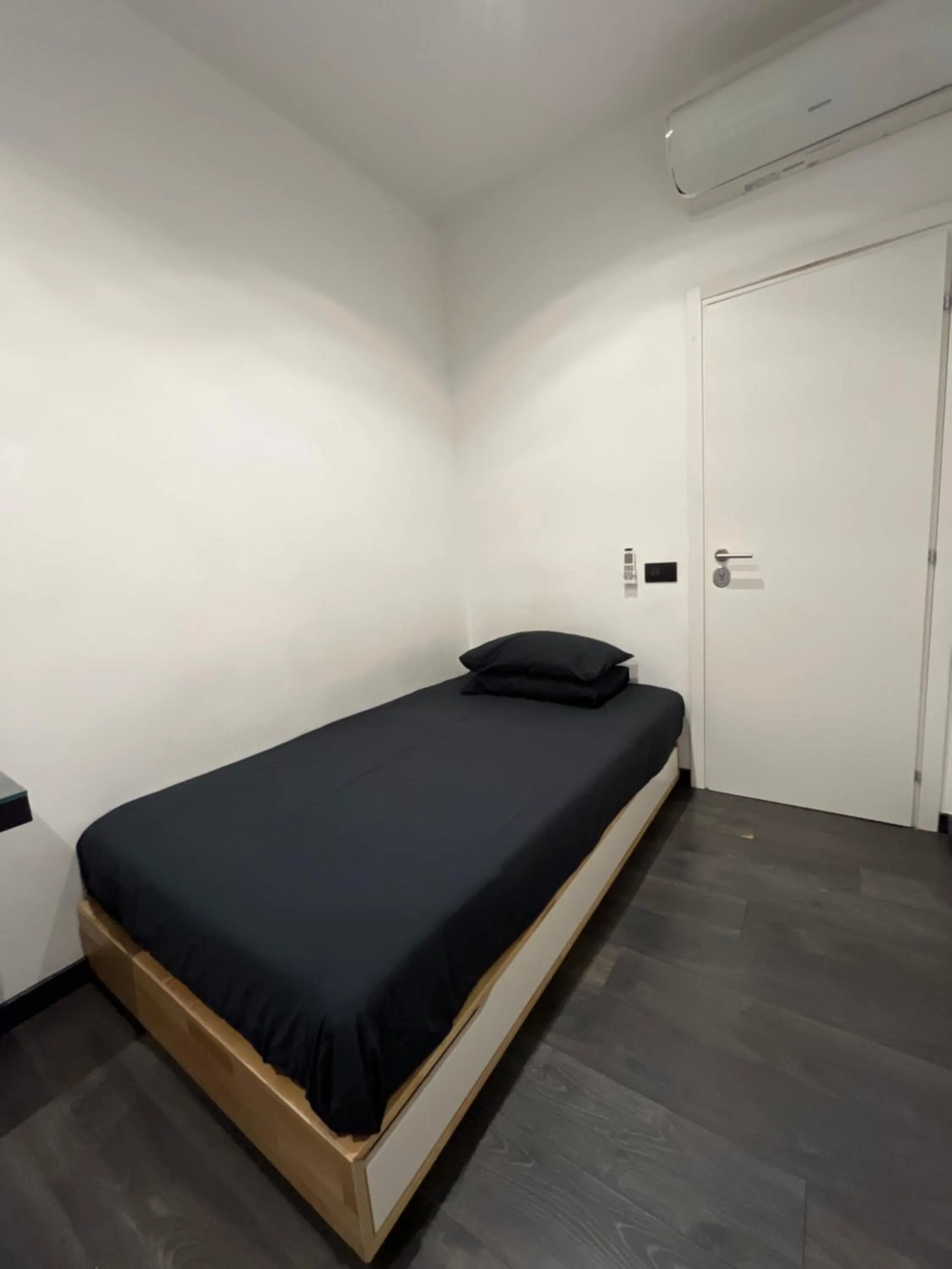 Bed in Cinecittà Luxury GUEST HOUSE