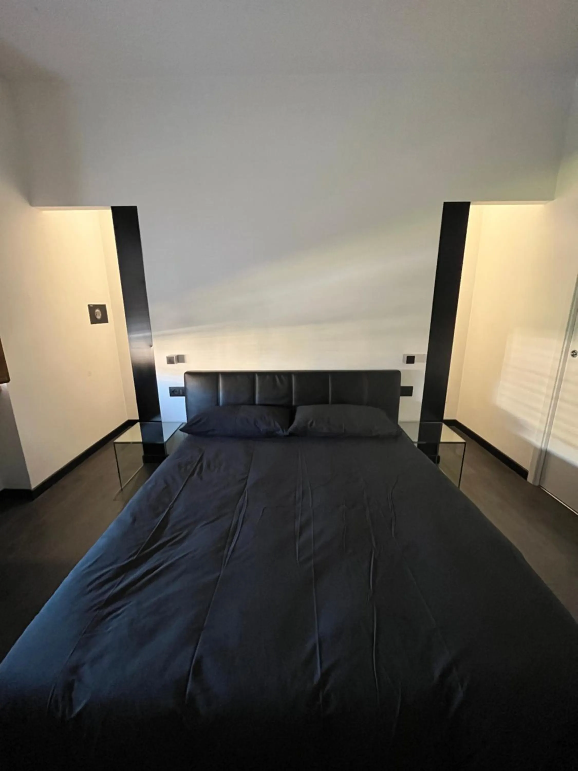 Bed in Cinecittà Luxury GUEST HOUSE