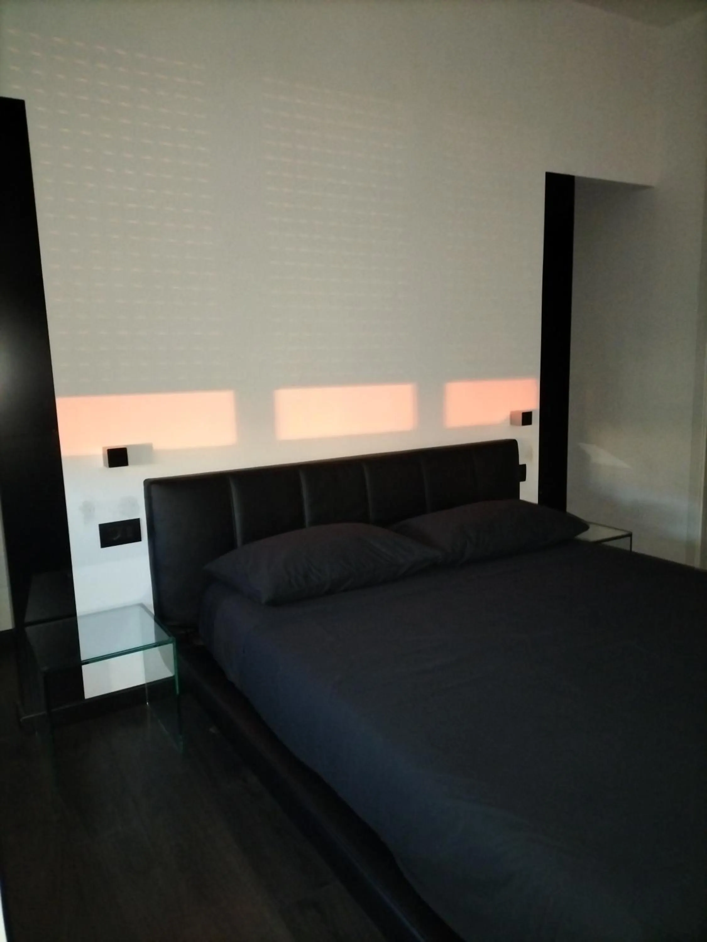 Bed in Cinecittà Luxury GUEST HOUSE