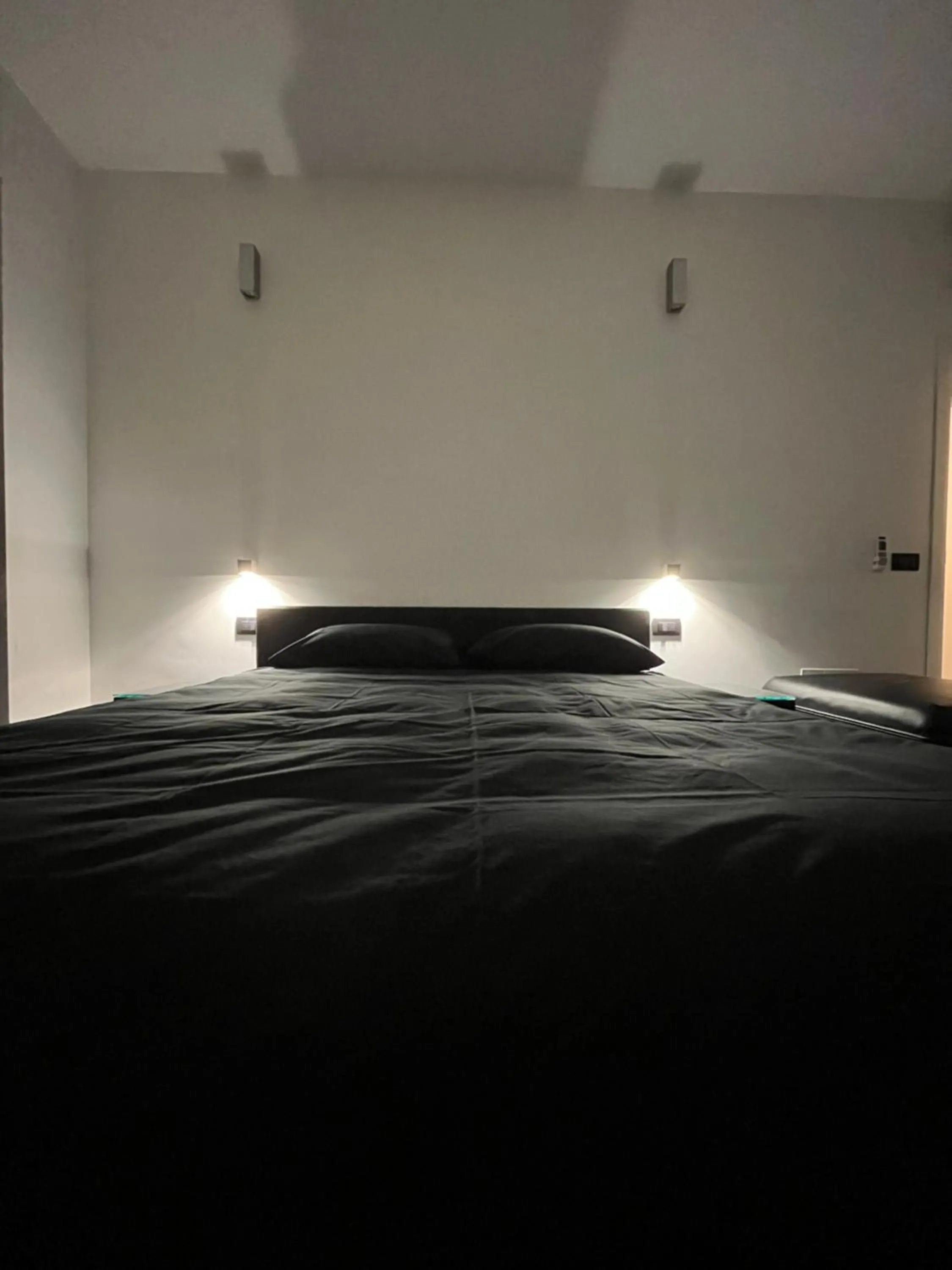 Bed in Cinecittà Luxury GUEST HOUSE