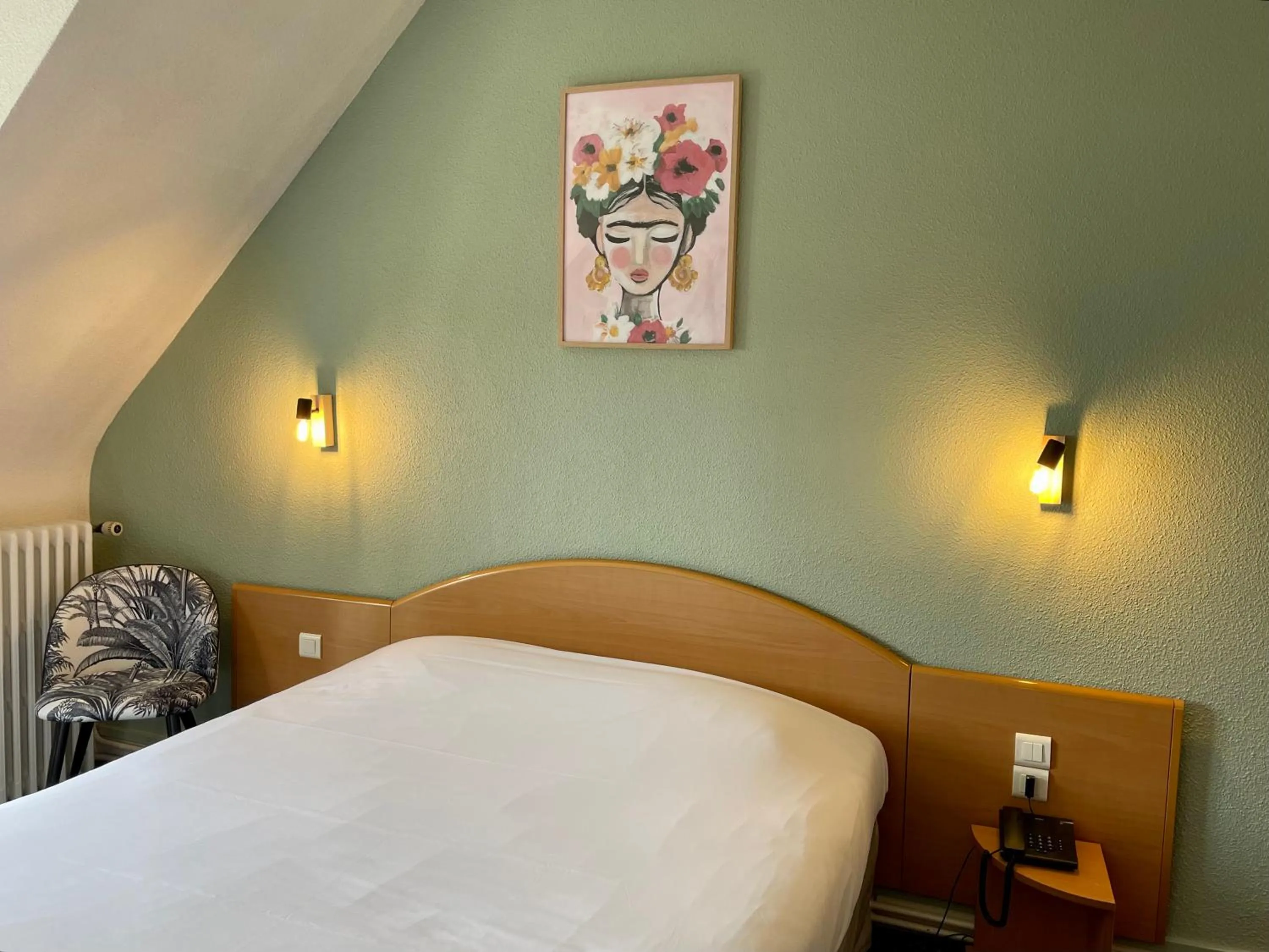 Bed in Hotel Le Progres