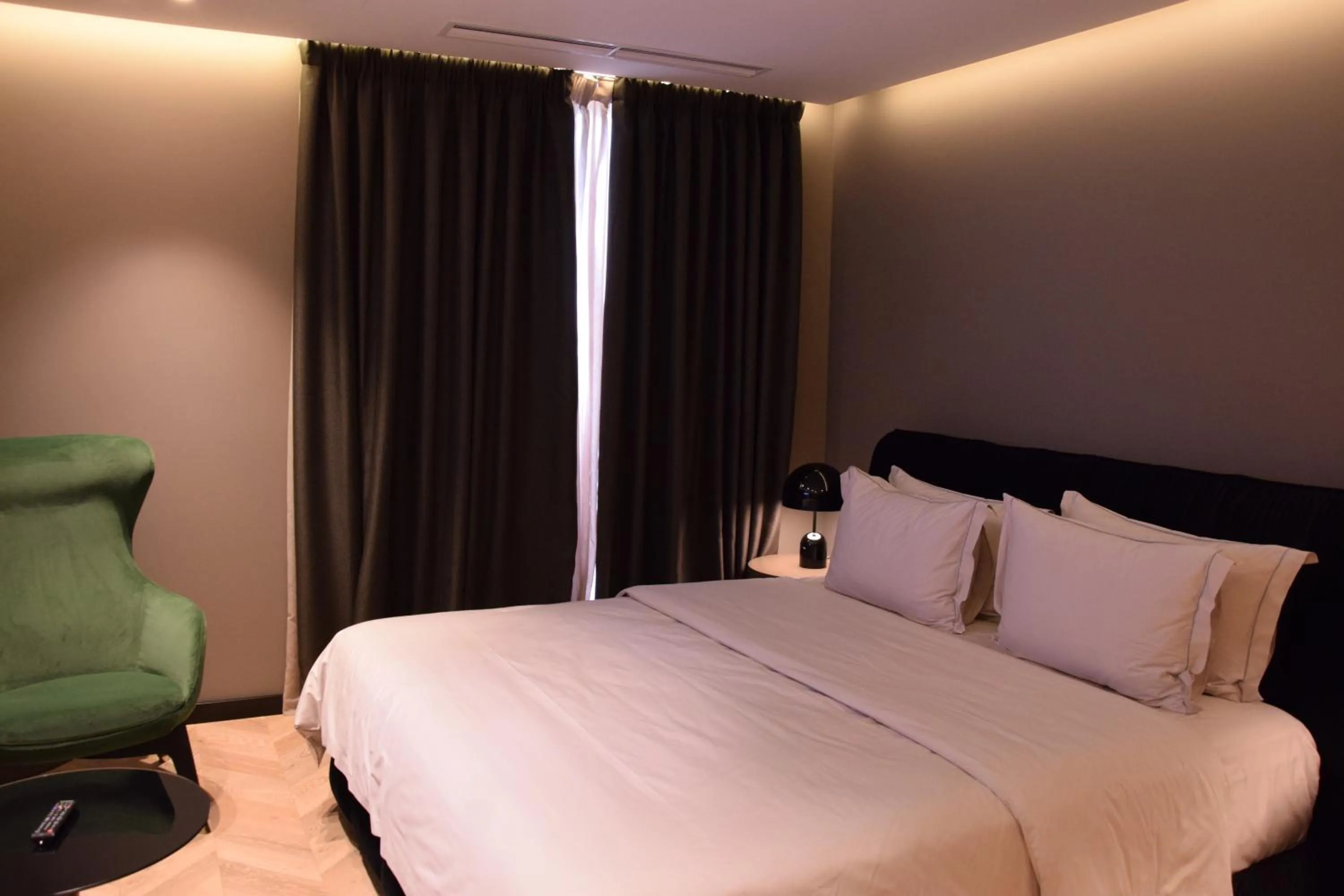 Photo of the whole room, Bed in Hotel Unik