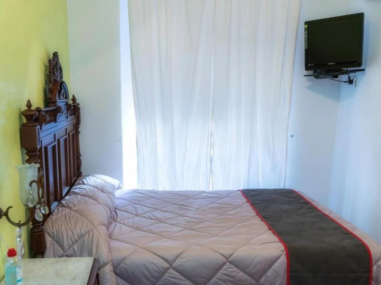 Bed in Hotel Las Palmeras by Vivere Stays