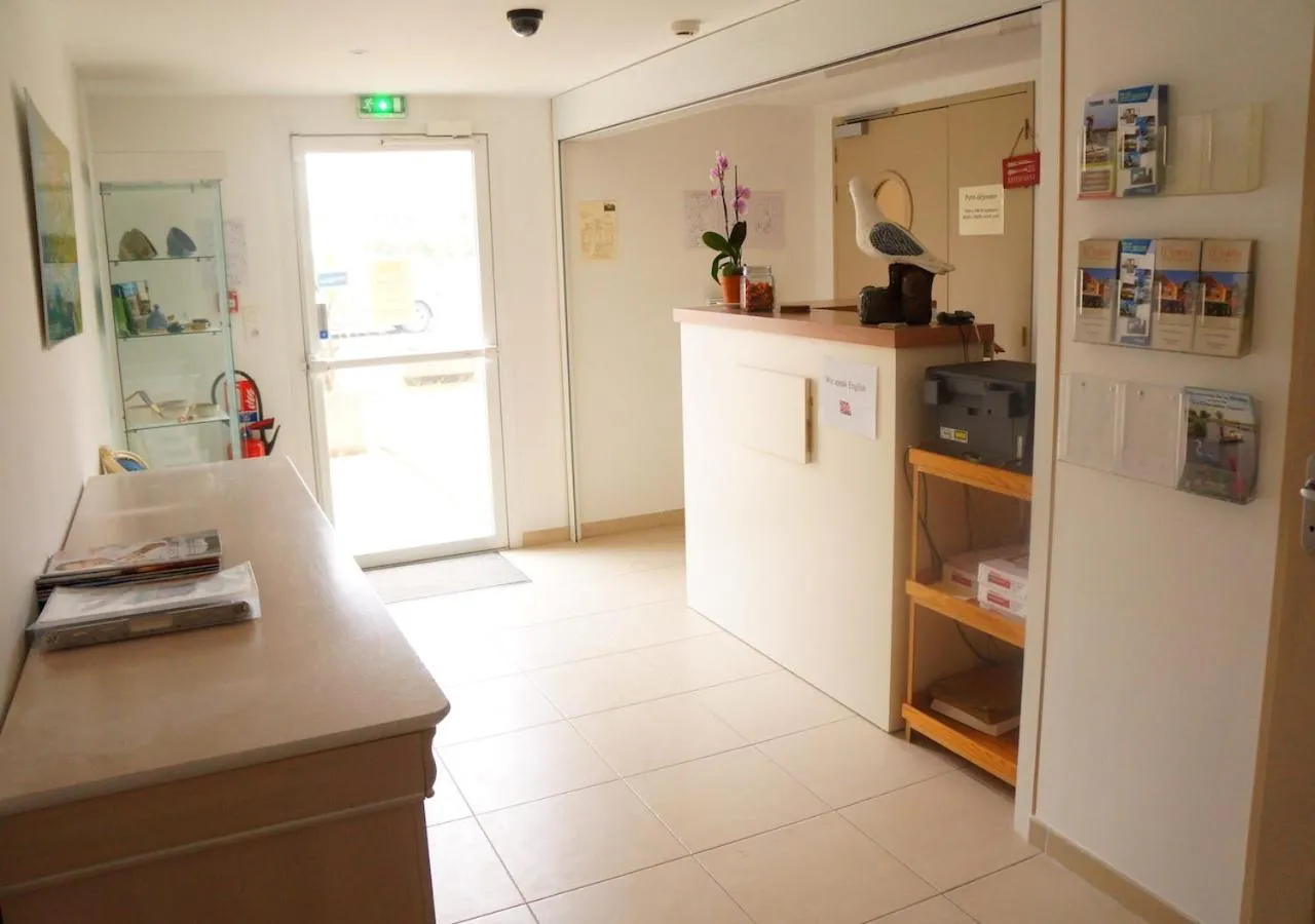 Lobby or reception in Hotel et Studios Le Marina Baie de La Baule