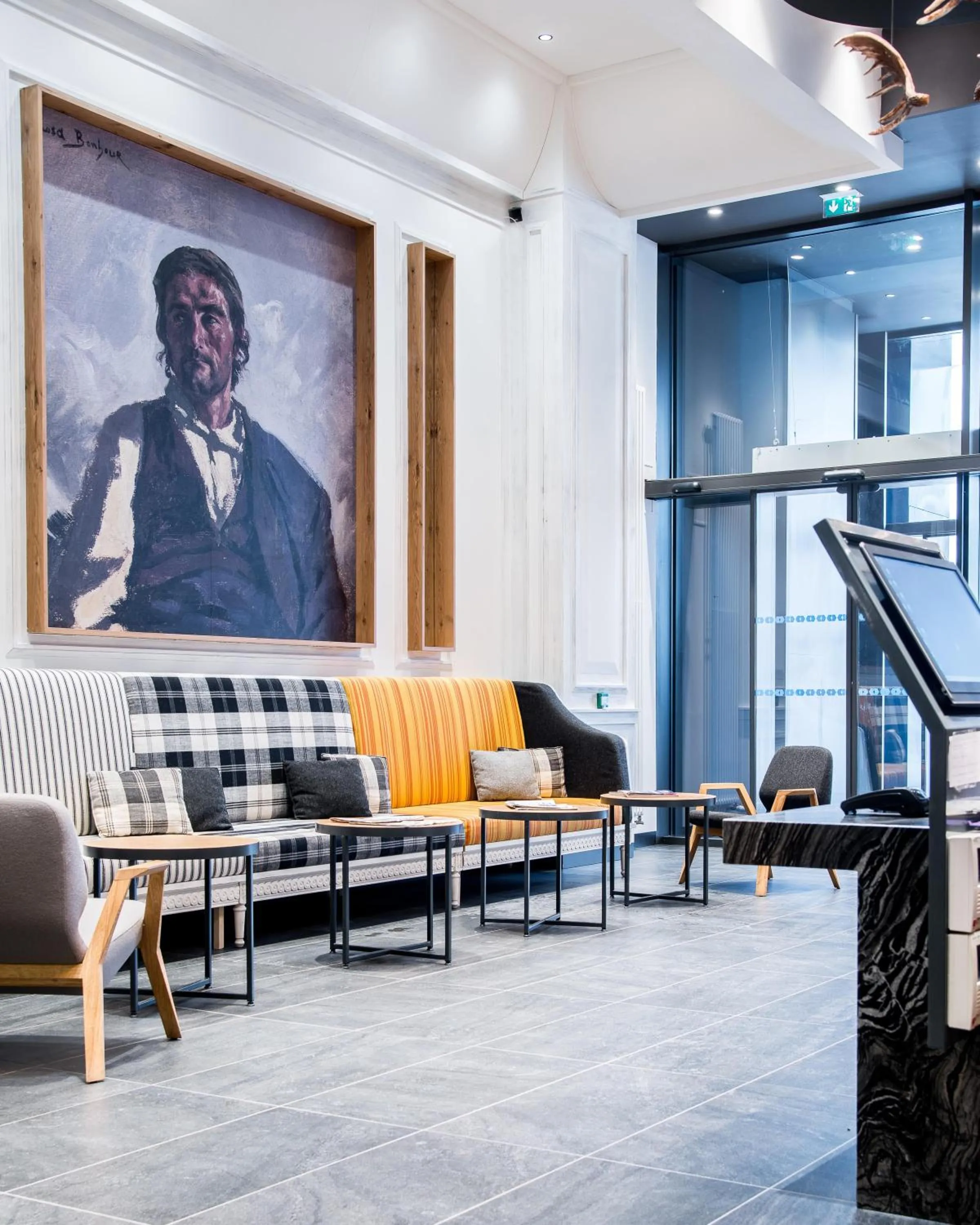 Lobby or reception in Alpina Eclectic Hotel